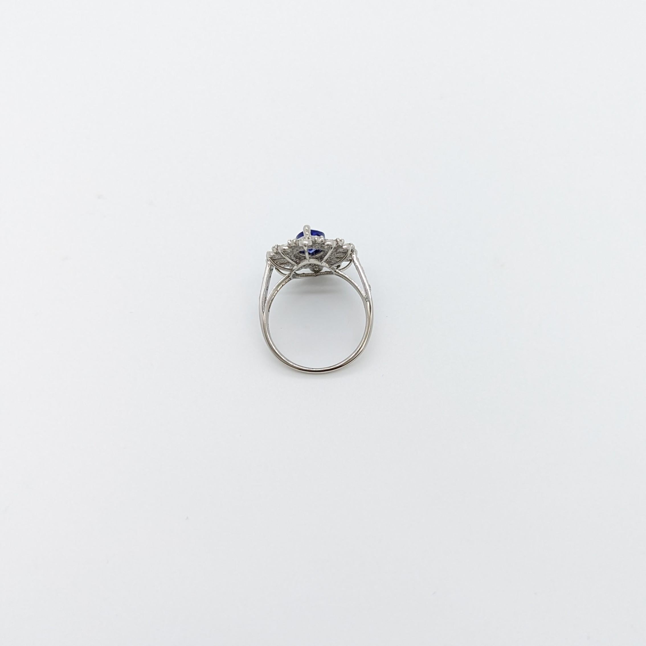 Tanzanite Marquise and White Diamond Round Cocktail Ring in Platinum For Sale 1