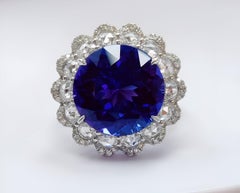 Tanzanite Moon - Round Tanzanite set with Round Rosecut Diamonds in 18K