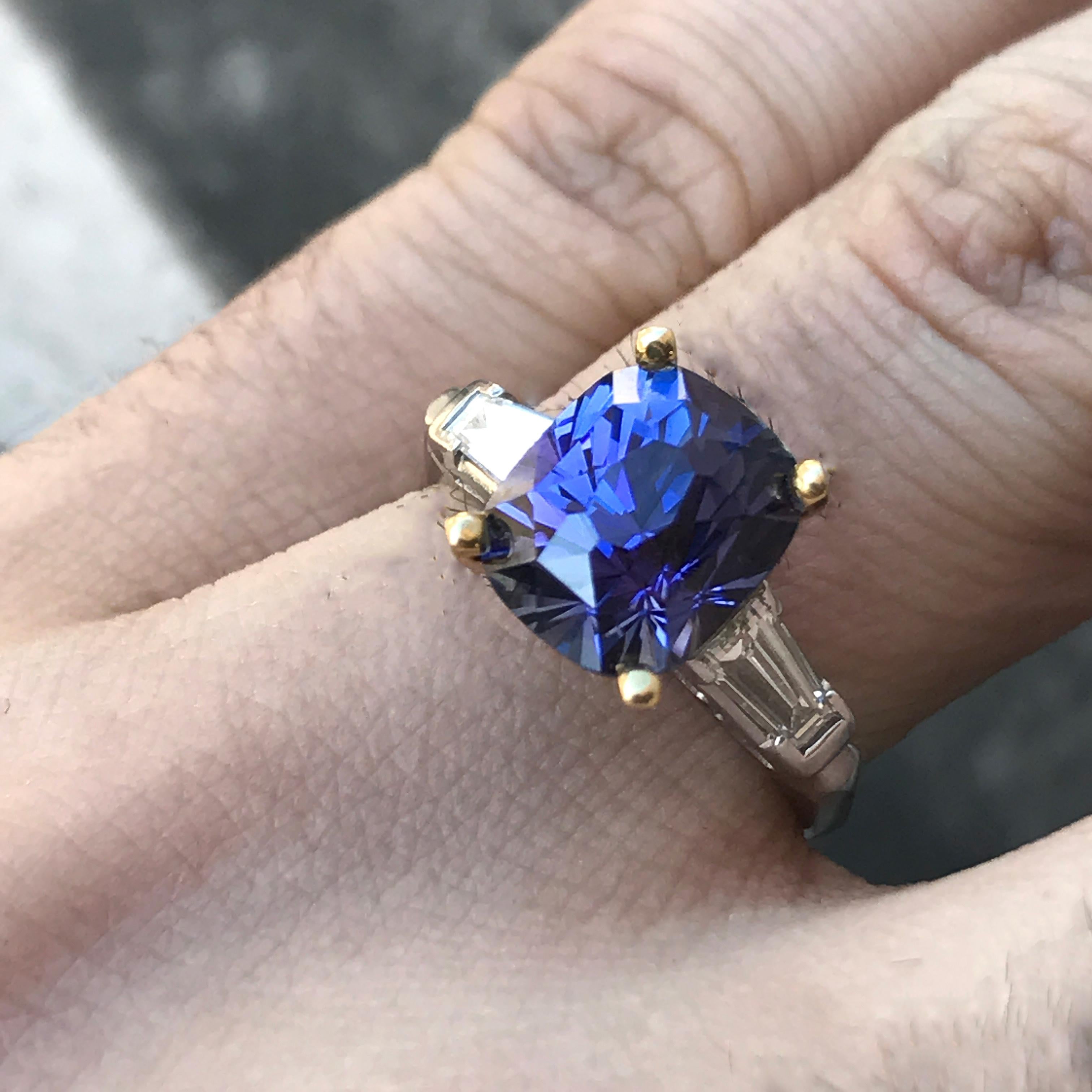 BSO00001
Ring may have to be made to order depending on finger size , please allow 3 to 6 weeks but if you have a sooner delivery date needed let us know and we will see if we can accommodate you.

Stunning 4.30 Carat + Vivid Blueish Purple Cushion