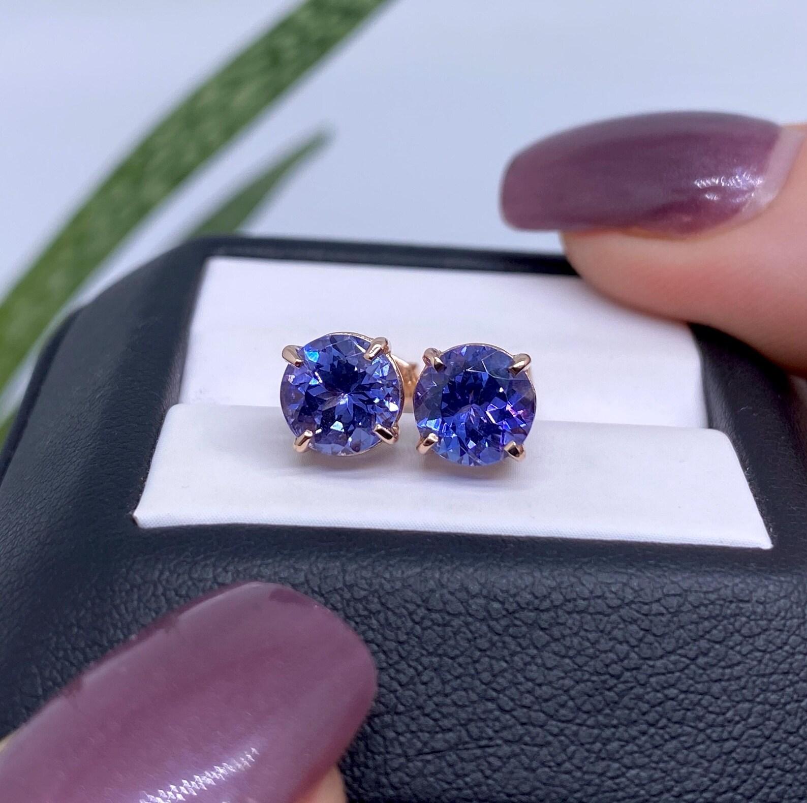 Tanzanite natural gemstone Stud Earrings, 14 Karat Rose Gold, certified!

Main Stone: Tanzanite
Main Stone Creation: Natural
Main Stone Color: purple
Main Stone Origin: Tanzania
Main stone weight: 2.20Ct
Main stone size: 6.5x6.5mm
Earrings Size: