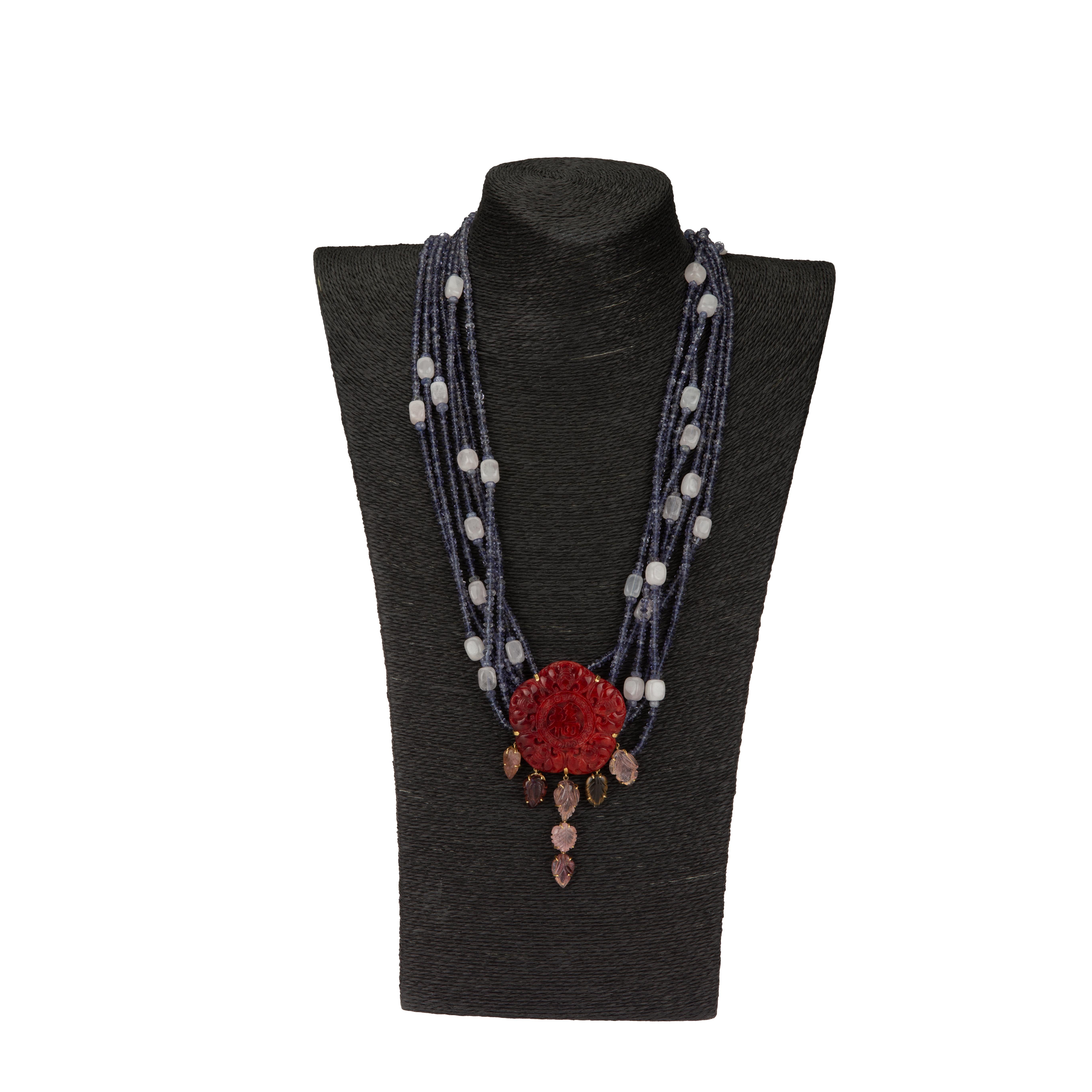 Amazing multi thread necklace with  faced tanzanite stone, rose quartz, central with carved Jace surrounded with tourmaline carved leaf, 18 k Gold gr 13,80. Length 58 cm.
All Giulia Colussi jewelry is new and has never been previously owned or worn.