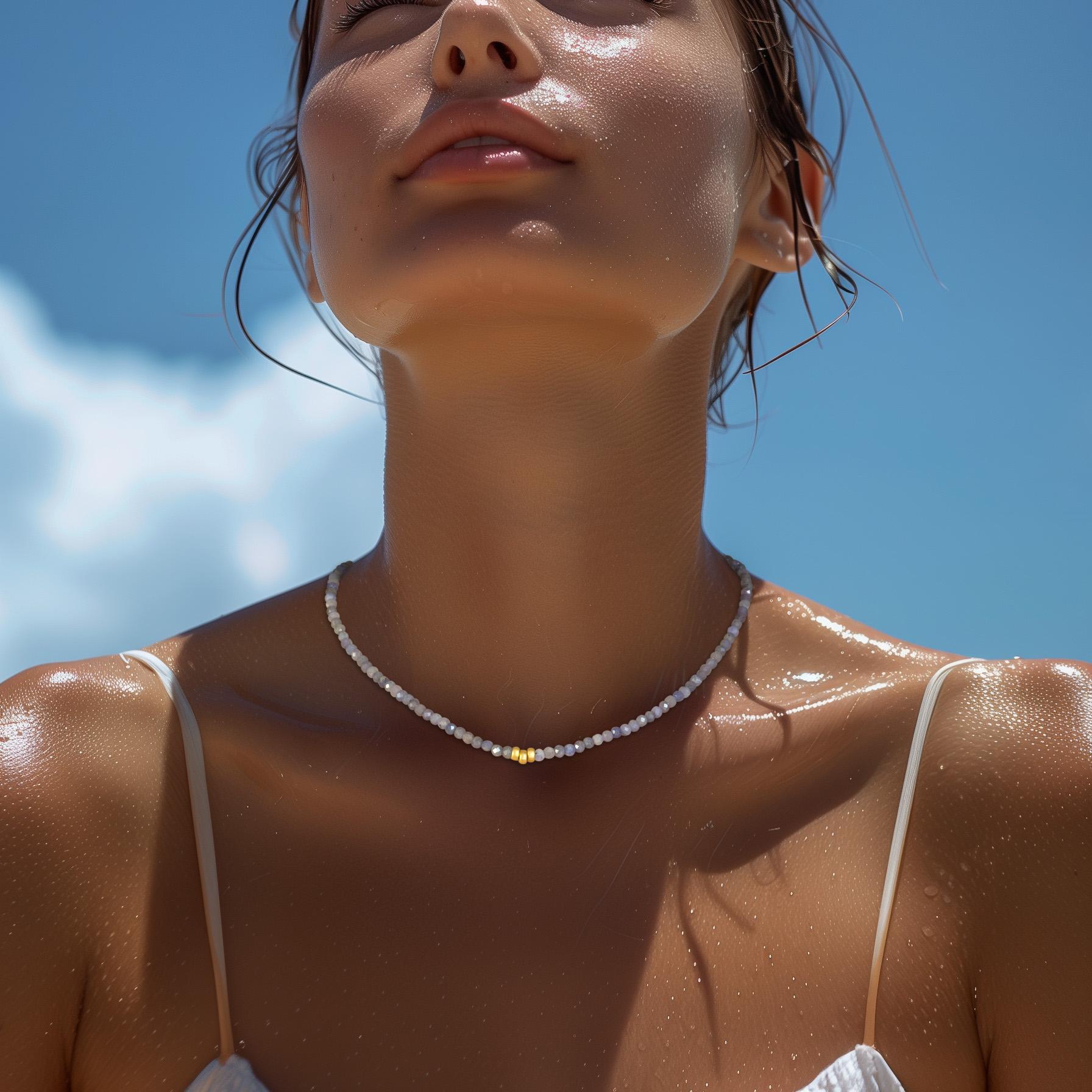 This captivating tanzanite and 14k gold necklace from Bombyx House radiates an aura of sophistication and timeless allure.

	•	16