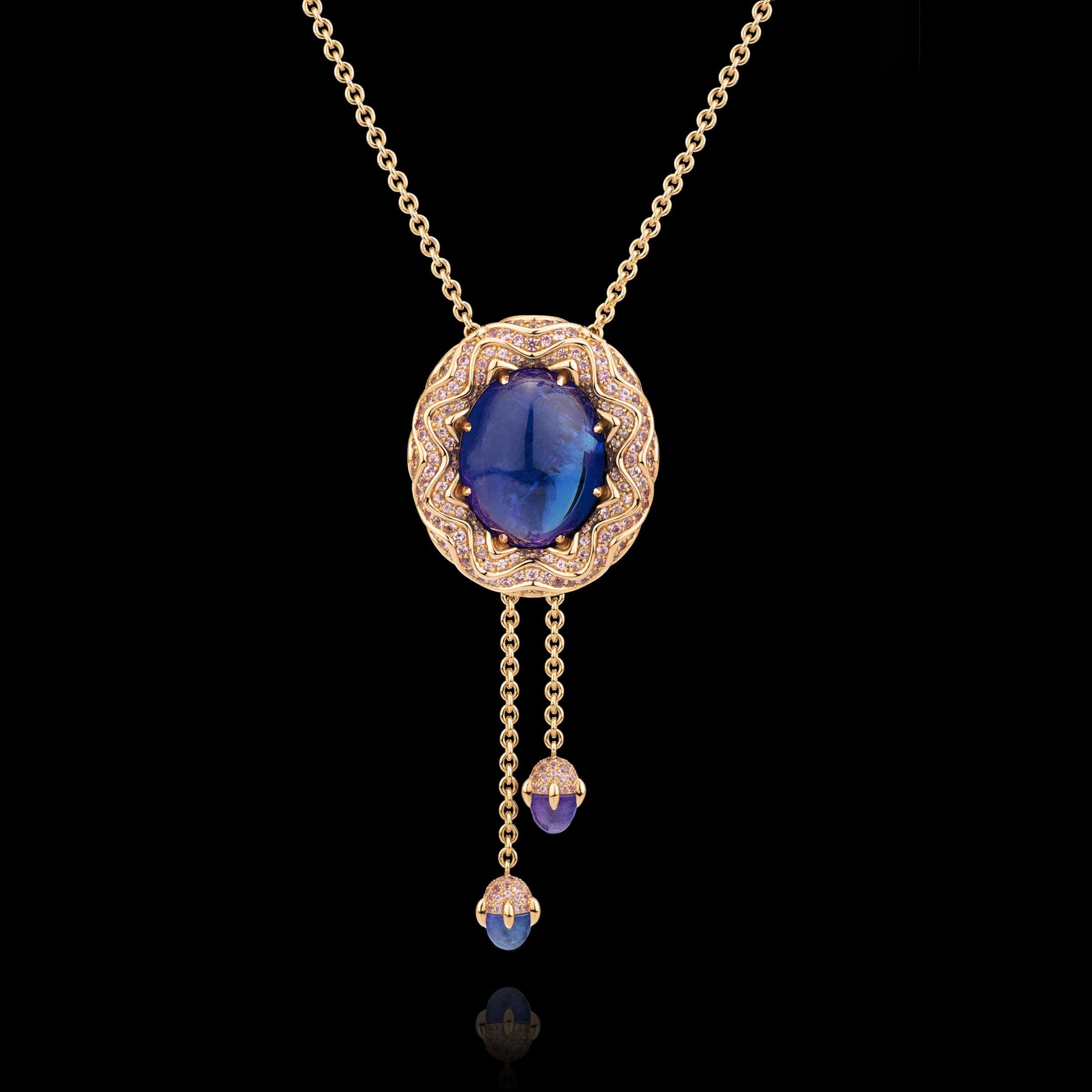 Enchanting tanzanite necklace from our Starlight Collection.
-Handmade of 18K rose gold.
-Center Stone: deep purplish blue cabochon cut tanzanite, 73,21ct.
-Handset with 332 rose-colored sapphires, ca 10ct total.
-2 dangling cabochon cut tanzanites,