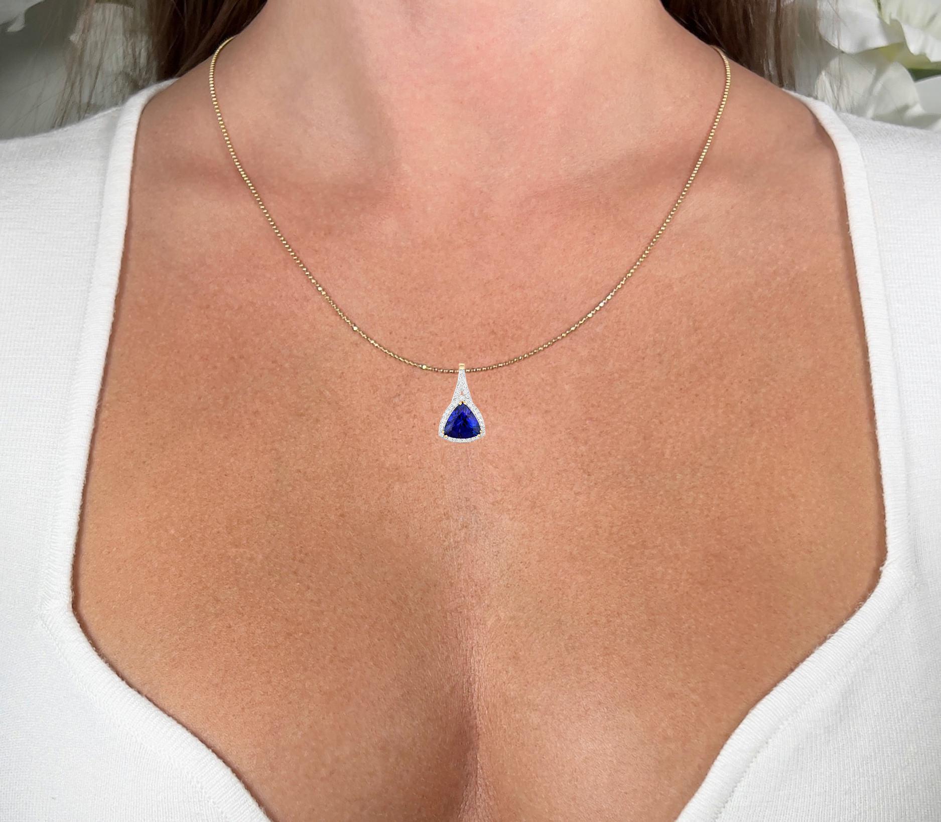 It comes with the Gemological Appraisal by GIA GG/AJP
All Gemstones are Natural
Trillion Tanzanite = 2.48 Carat
36 Round Diamonds = 0.16 Carats
Metal: 14K Yellow Gold
Pendant Dimensions: 19 x 11 mm
