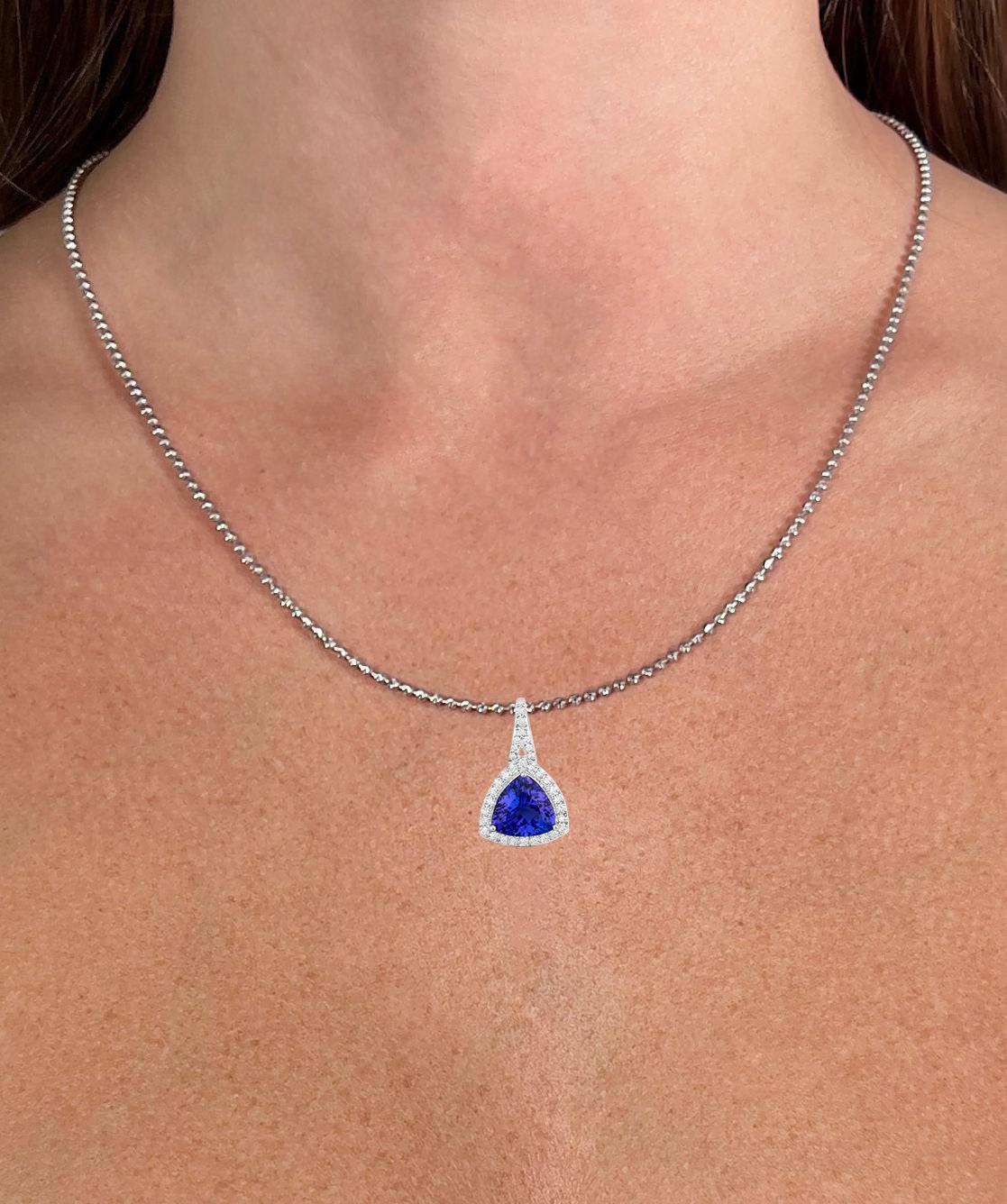 Contemporary Tanzanite Necklace With Diamond Halo 2.84 Carats 14K White Gold For Sale