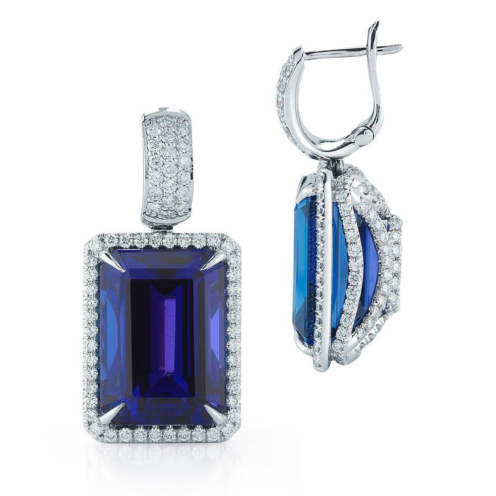 TANZANITE DIAMOND EARRING
Two impeccably matched Tanzanites are enhanced by glittering diamond halos.

Item:	# 01930
Setting:	18K W
Lab:	GIA
Color Weight:	37.34 ct. of Tanzanite
Diamond Weight:	3.05 ct. of Diamonds