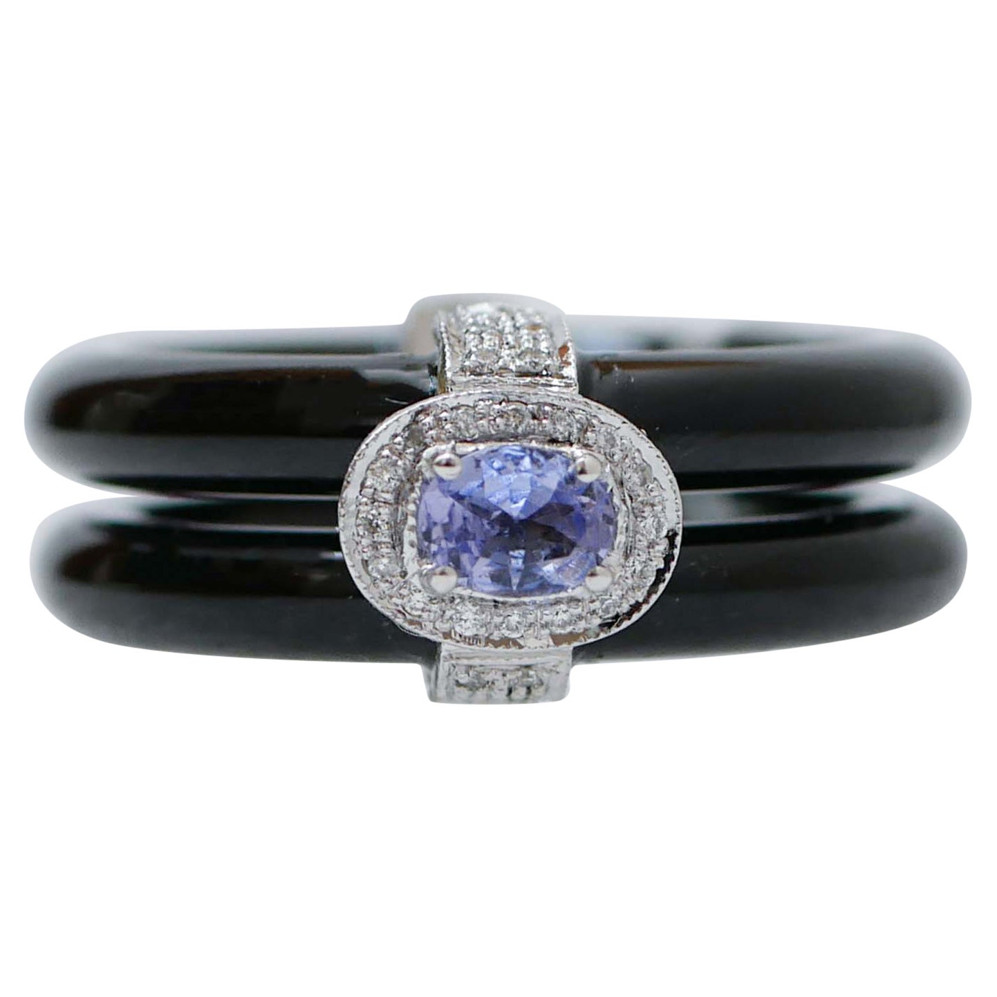 Tanzanite, onice, diamanti, anello di platino.