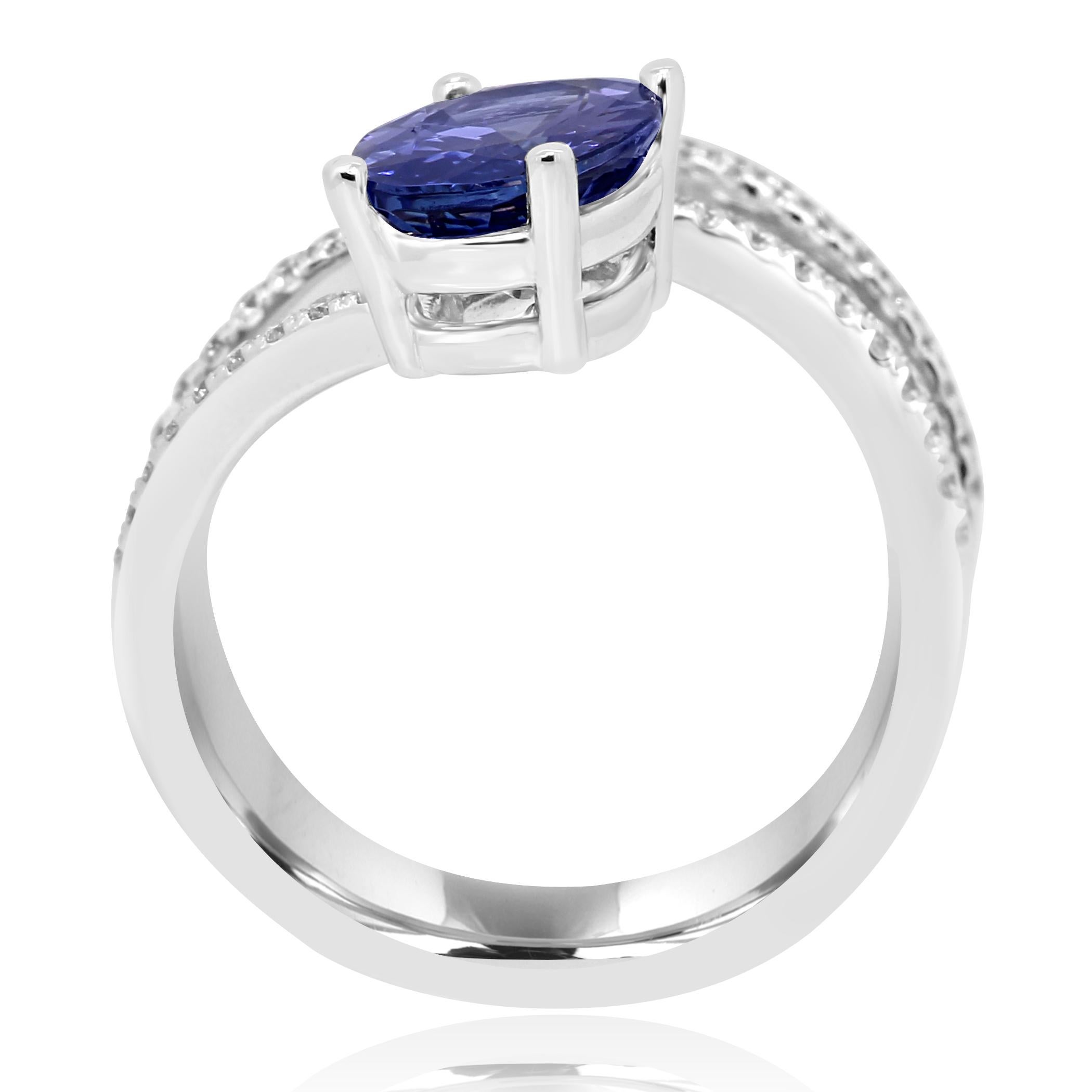 Contemporary Tanzanite Oval and Diamond Gold Spiral Cocktail Fashion Ring