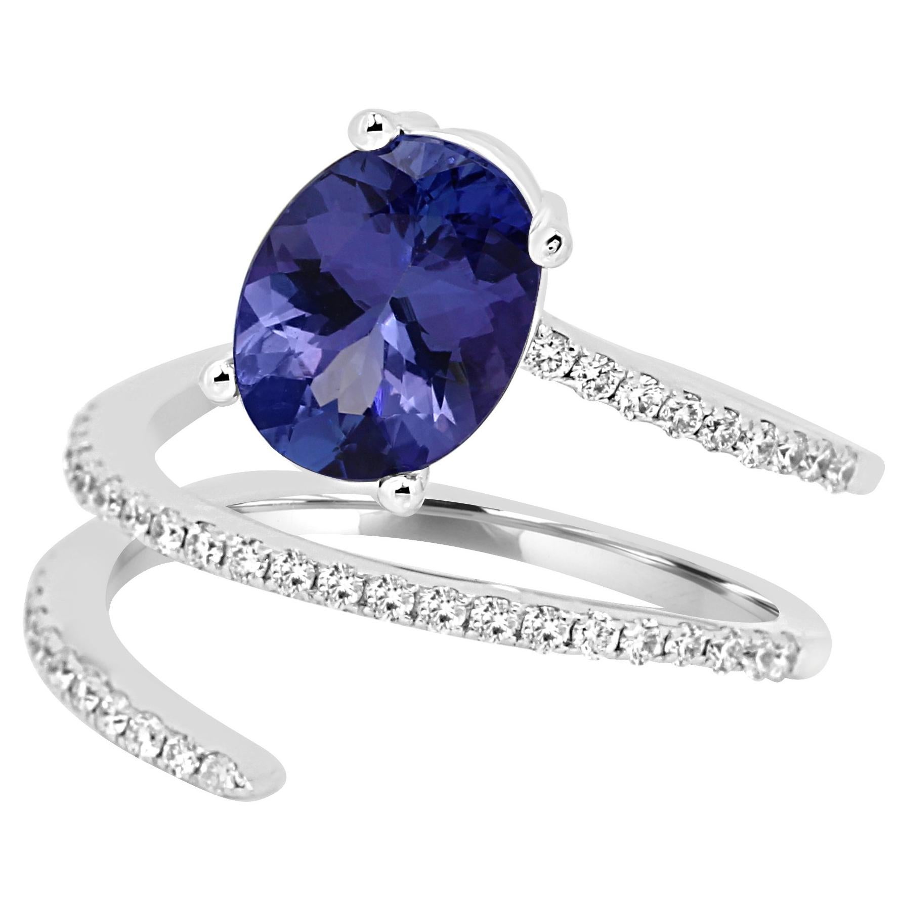 Tanzanite Oval and Diamond Gold Spiral Cocktail Fashion Ring at 1stDibs
