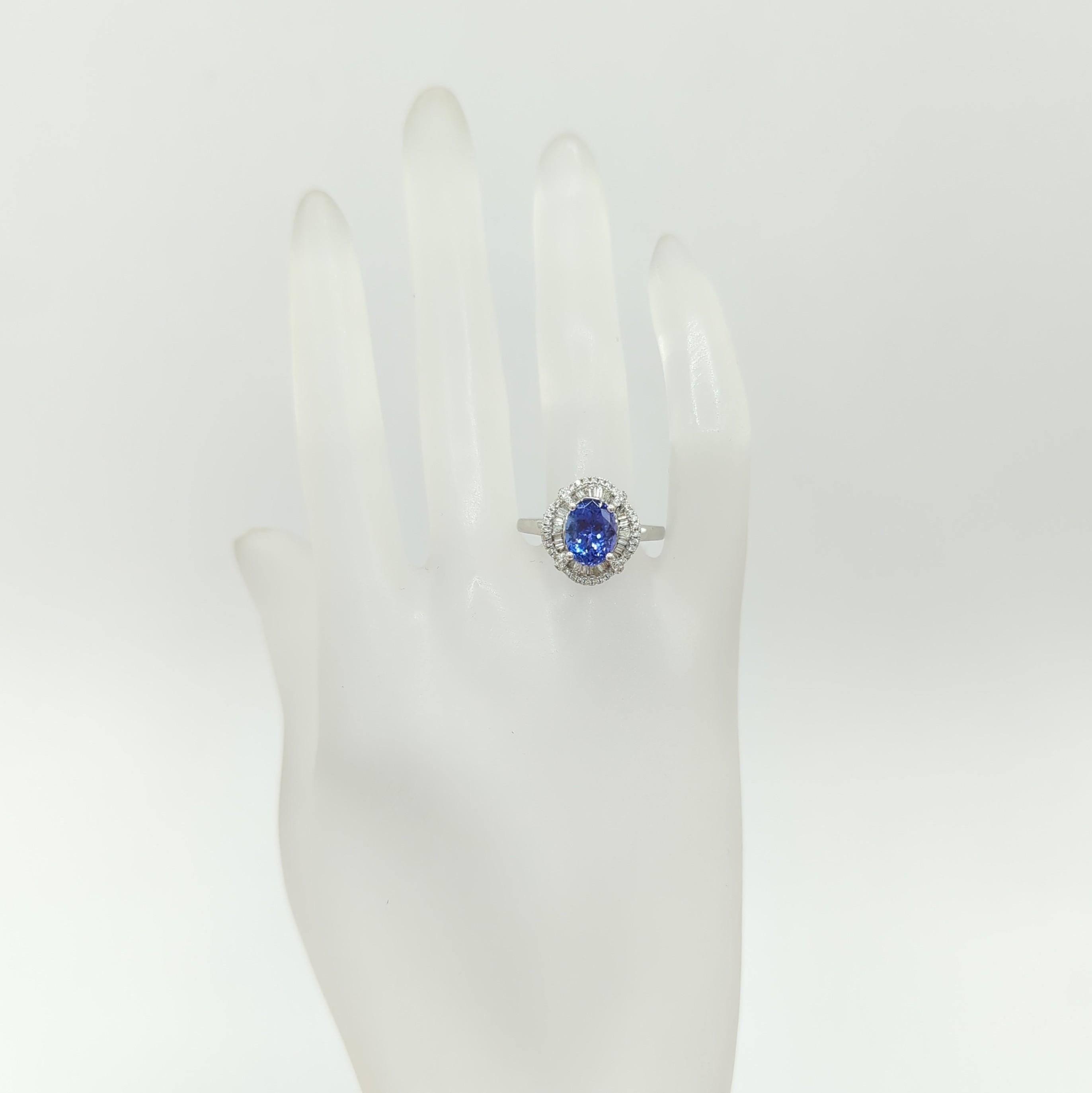 Oval Cut Tanzanite Oval and White Diamond Cocktail Ring in 14 Karat White Gold For Sale