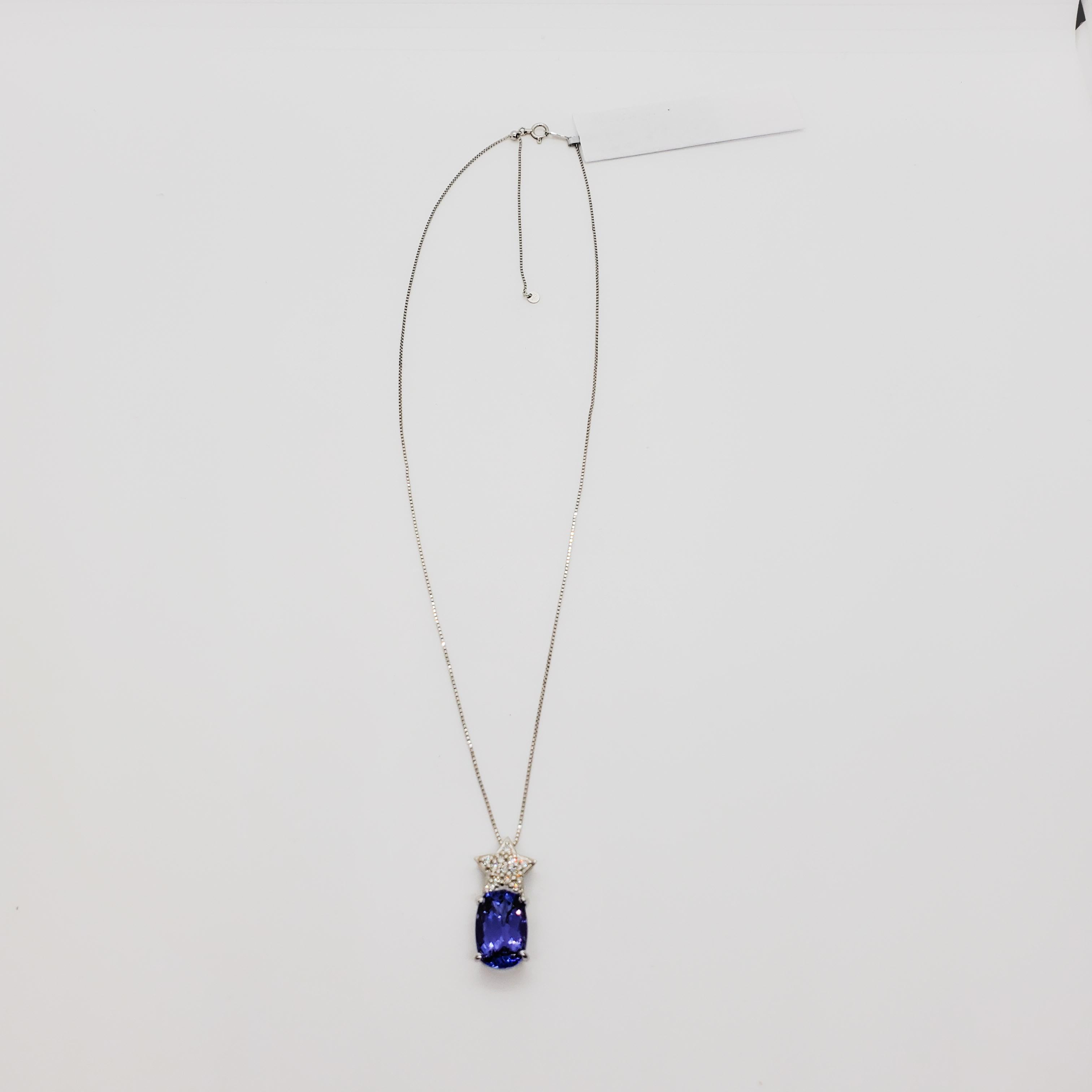 Women's or Men's Tanzanite Oval and White Diamond Pendant Necklace in Platinum For Sale