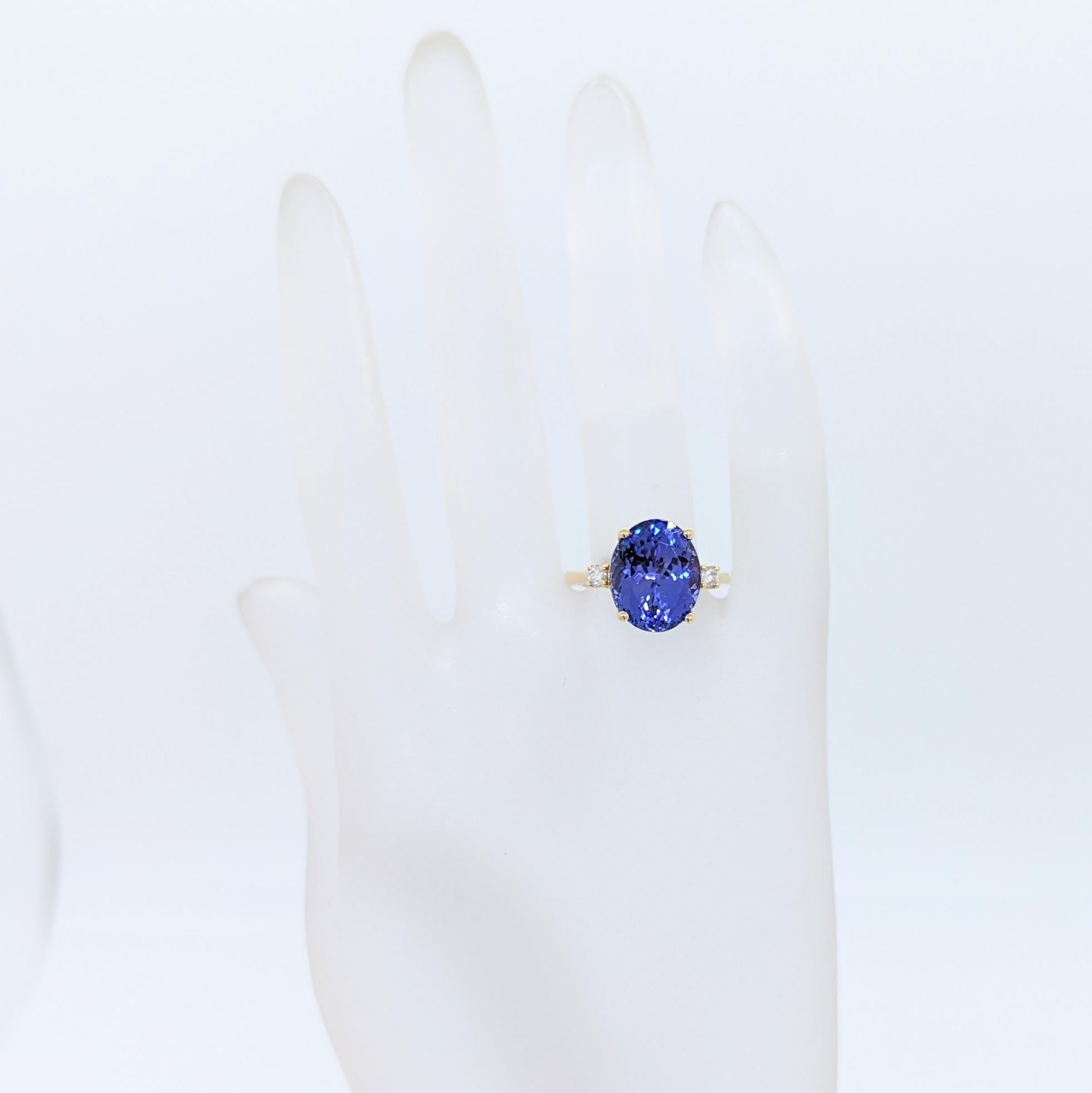 Oval Cut Tanzanite Oval and White Diamond Ring in 14K Yellow Gold For Sale