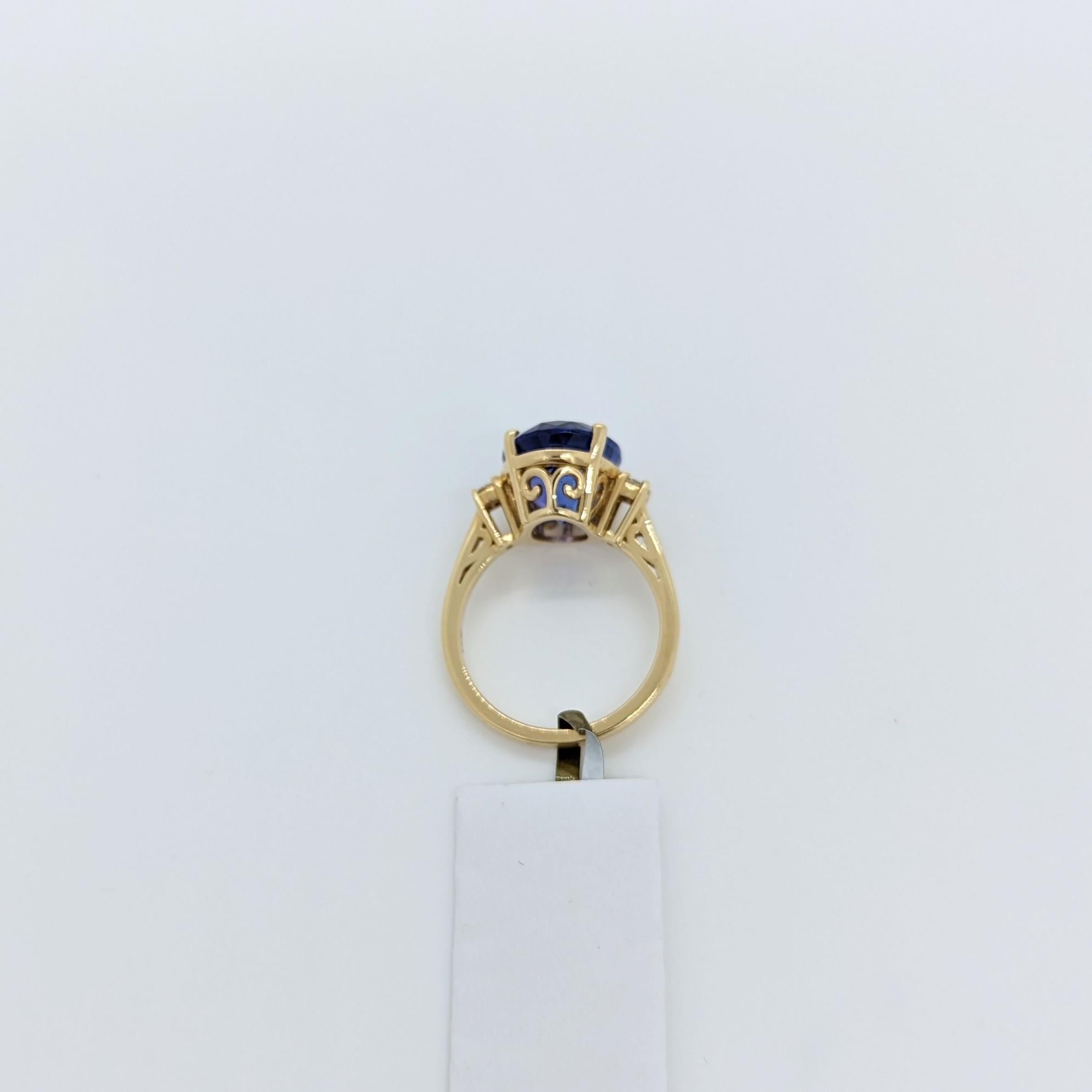 Women's or Men's Tanzanite Oval and White Diamond Ring in 14K Yellow Gold For Sale