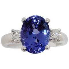 Tanzanite Oval and White Diamond Round 3-Stone Ring in Platinum