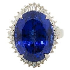 Tanzanite Oval and White Diamond Round 
Baguette Cocktail Ring in Platinum