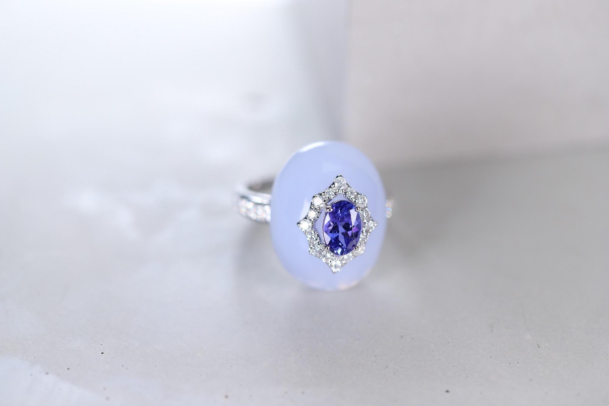 Stunning, timeless and classy eternity Unique Ring. Decorate yourself in luxury with this Gin & Grace Ring. The 14k White Gold jewelry boasts Oval-cut Prong Setting Tanzanite (1 pcs) 0.86 Carat, Oval-cab Prong Setting Chalcedony (1 pcs) 15.63 Carat,