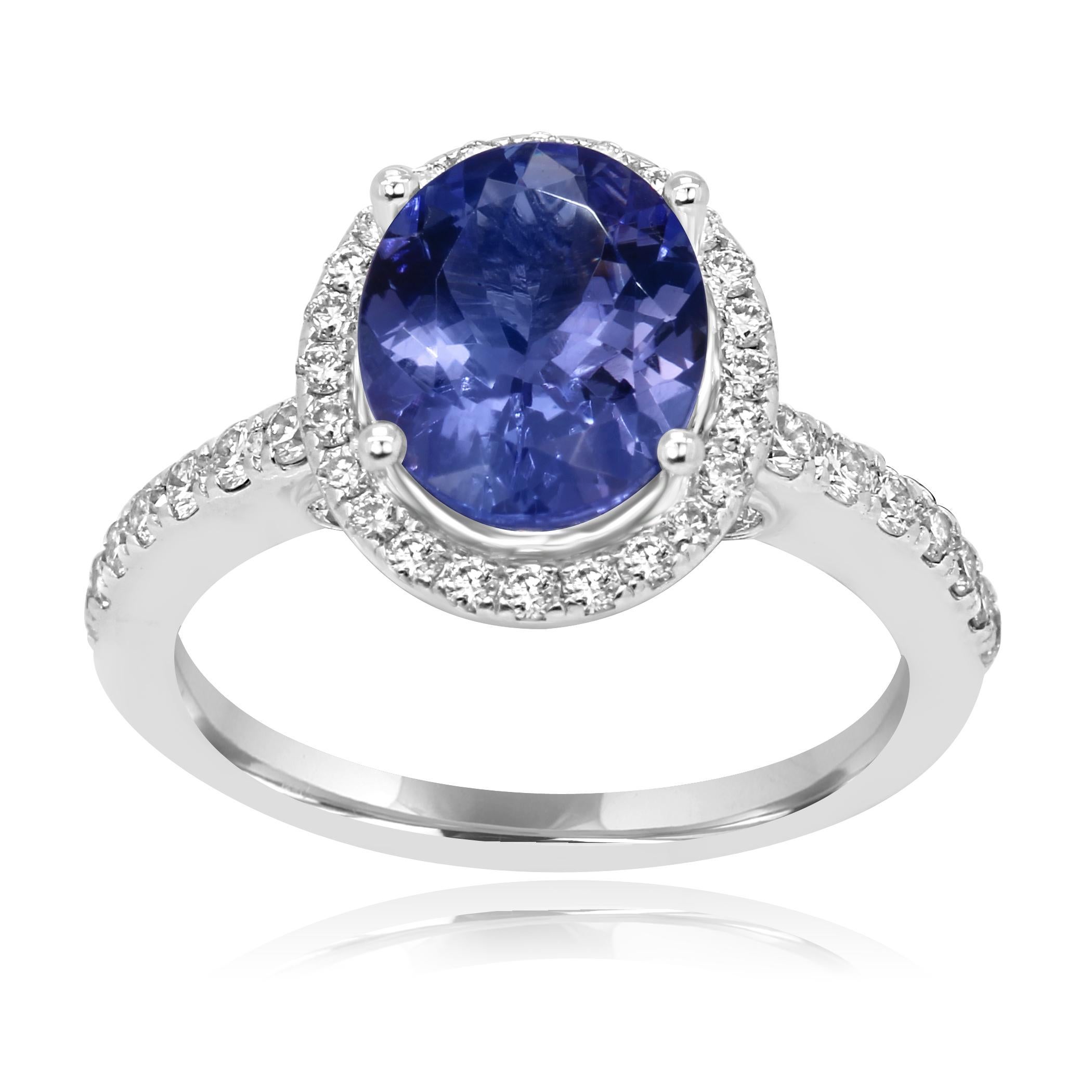 Tanzanite Oval 2.29 Carat Encircled in a Halo of White Round Diamonds 0.34 Carat in 14K White Gold always in style classic Fashion Bridal or Cocktail Ring.

Style available in different price ranges. Prices are based on your selection of 4C's Cut,