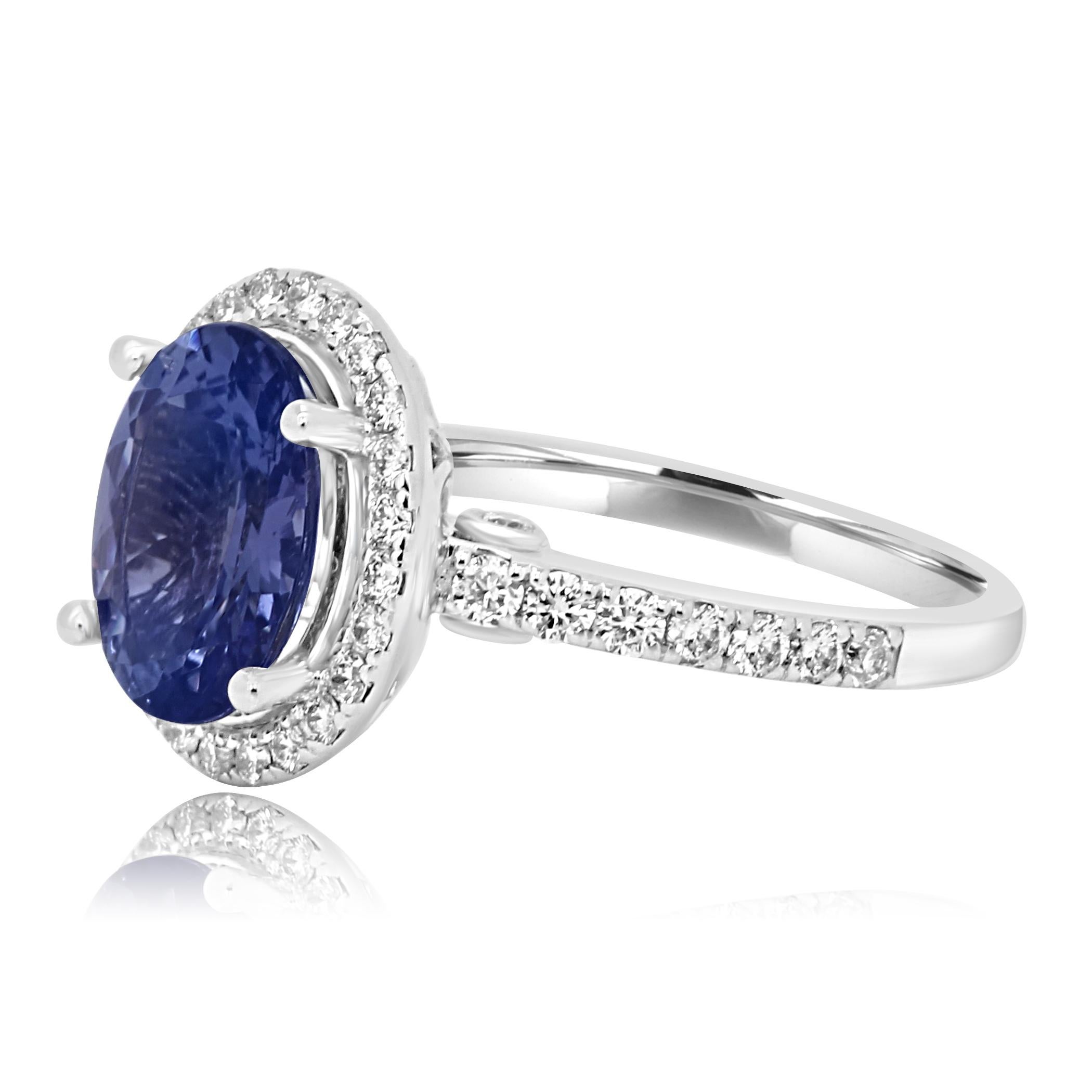 Modern Tanzanite Oval Diamond Halo Gold Classic Bridal Fashion or Cocktail Ring