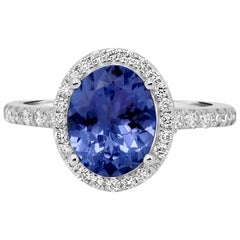 Tanzanite Oval Diamond Halo Gold Classic Bridal Fashion or Cocktail Ring