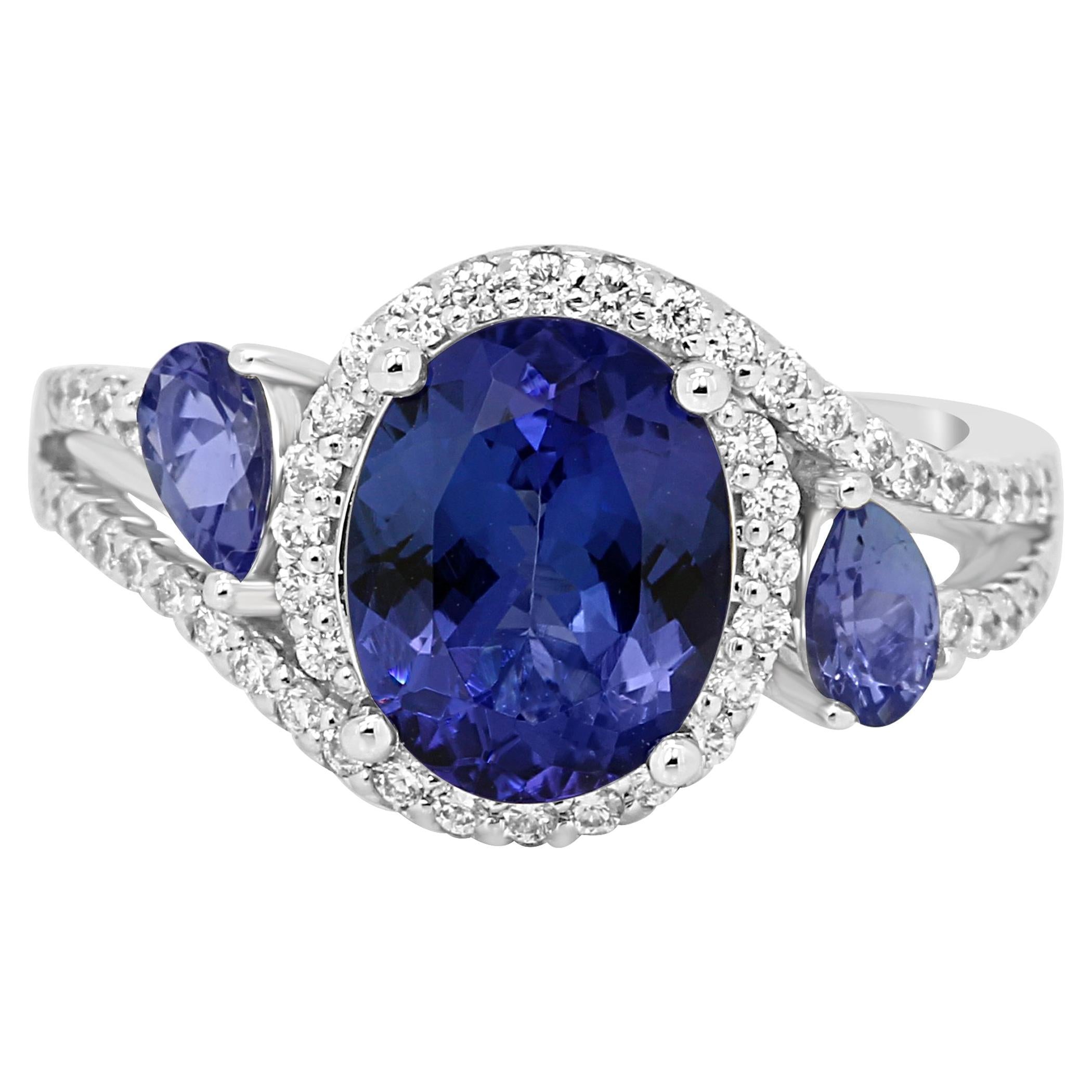 Tanzanite Oval Diamond Three-Stone Gold Halo Ring