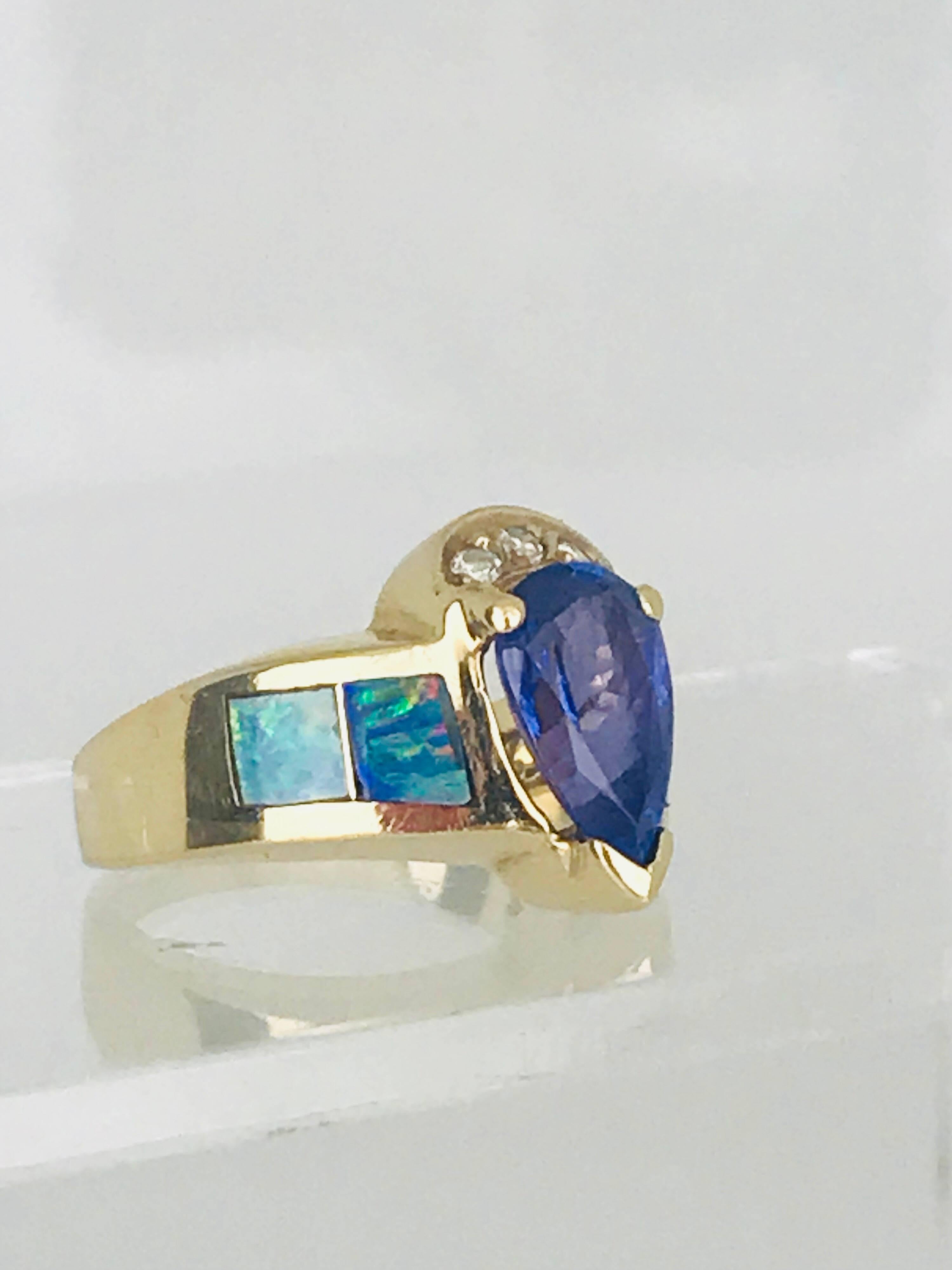 Tanzanite Pear Shaped Ring, Set with Australian Opal and Diamond, circa 1985 In Good Condition For Sale In Aliso Viejo, CA
