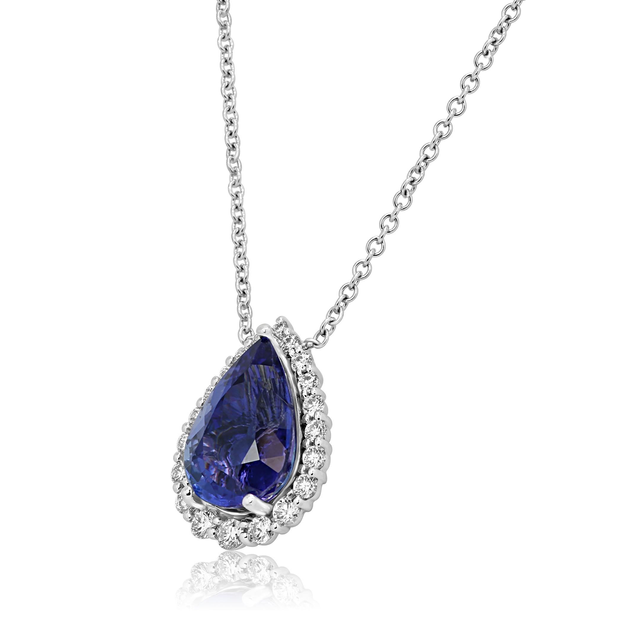 Stunning Tanzanite Pear 6.35 Carat encircled in a single Halo of White Colorless Diamonds VS-SI clarity 0.72 Carat set in 14K White Gold Chic Drop Pendant Chain Necklace with beautiful wire work gallery in back.

Style available in different price