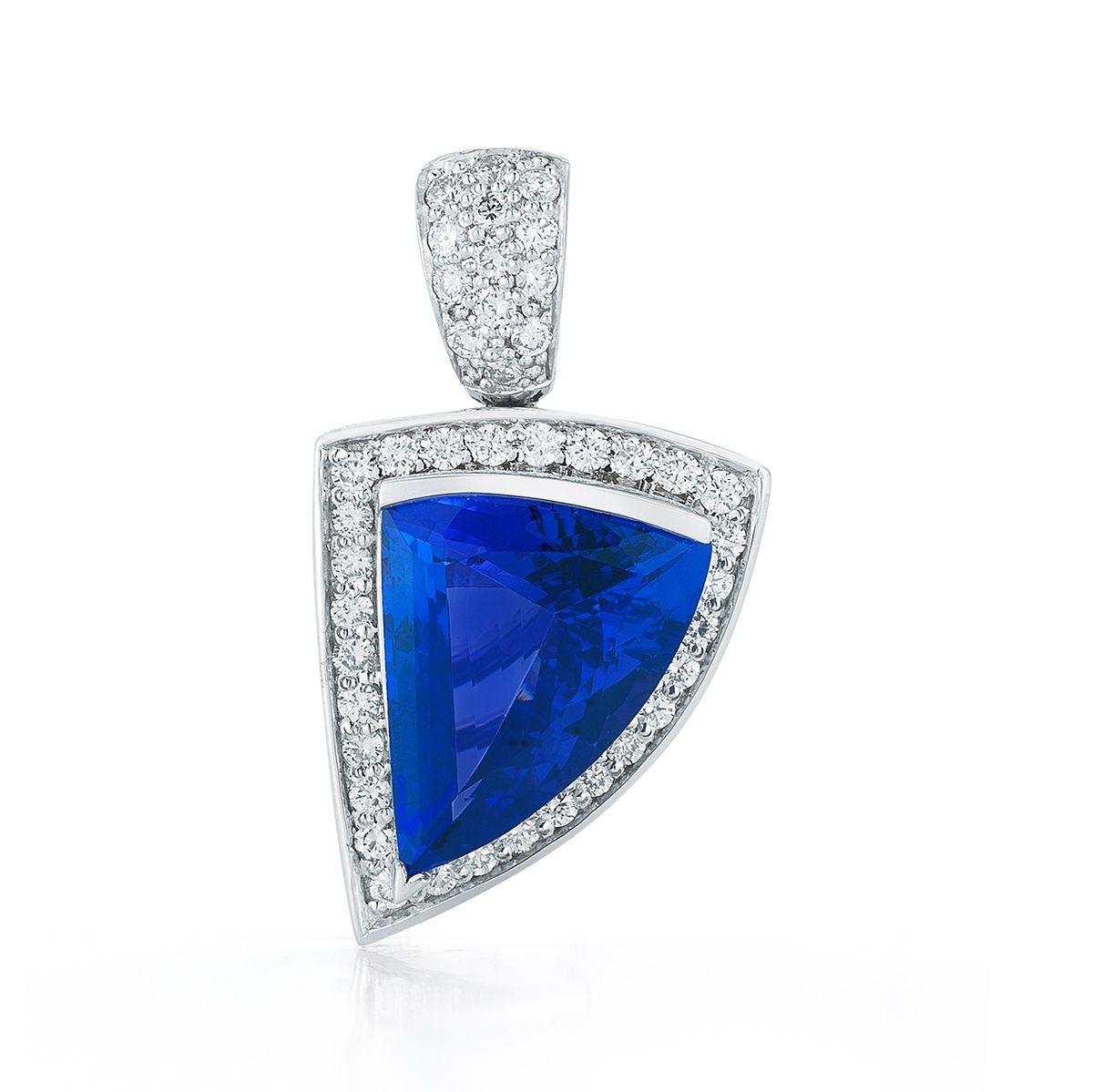 18k White Gold 7.43ct Tanzanite and .68ct Diamond Pendant
An asymmetrical cut on this Tanzanite highlights the multicolored
sparkle.
Item: # 01665
Metal: 18k W
Color Weight: 7.43 ct.
Diamond Weight: 0.68 ct.