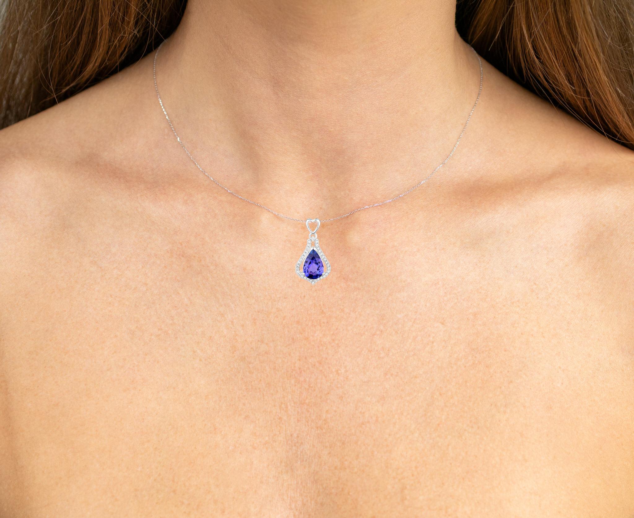 It comes with the Gemological Appraisal by GIA GG/AJP
All gemstones are natural
Tanzanite = 3.01 Carats
34 Diamonds = 0.28 Carats
Metal: 14K White Gold
Dimensions: 27 x 14 x 6 mm
Chain Included: 14K White Gold
Chain Length: 16 Inches