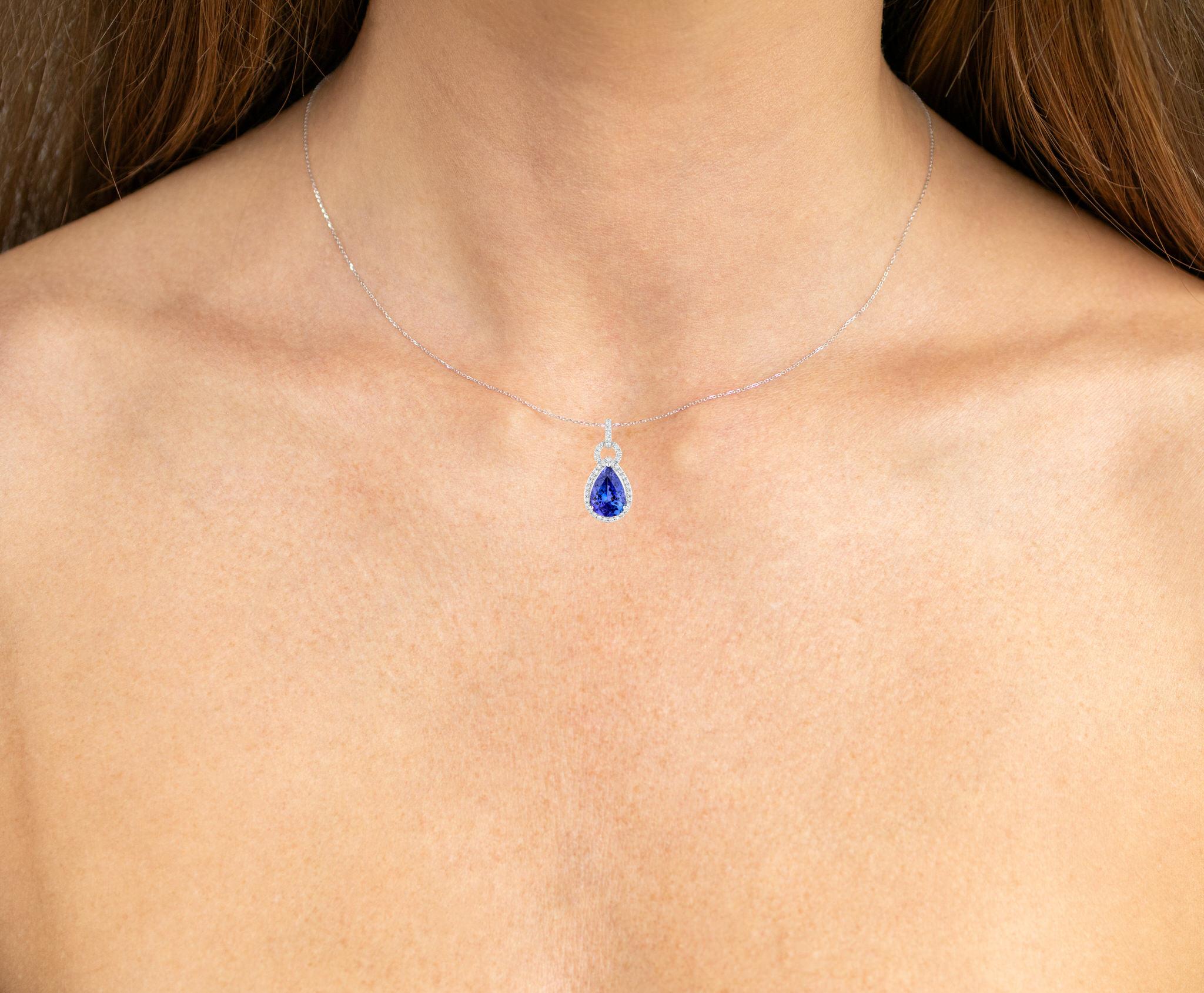 It comes with the Gemological Appraisal by GIA GG/AJP
All gemstones are natural
Tanzanite = 3.18 Carats
38 Diamonds = 0.30 Carats
Metal: 14K White Gold
Dimensions: 23 x 11 x 6 mm
Chain Included: 14K White Gold
Chain Length: 16 Inches