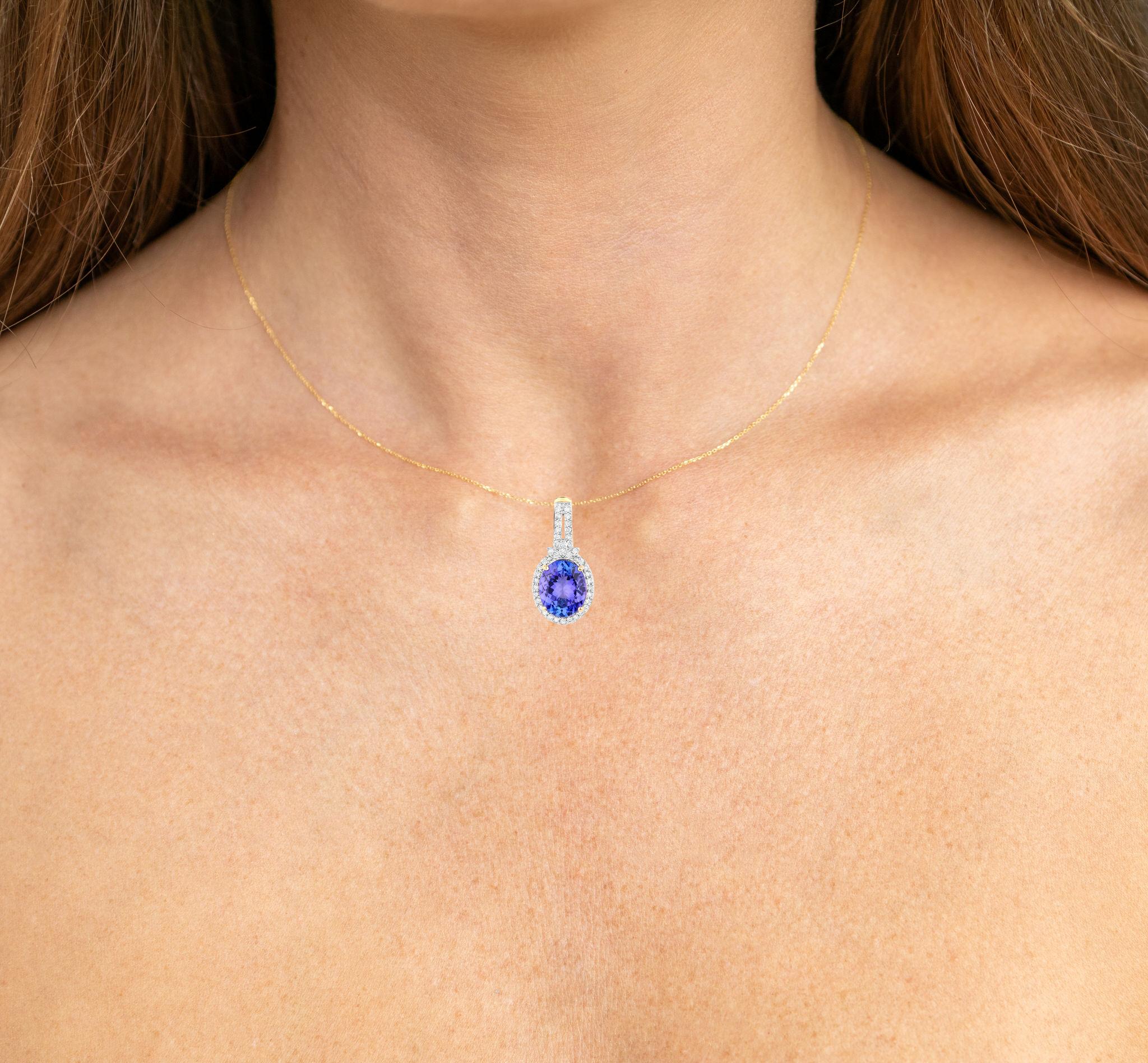 It comes with the Gemological Appraisal by GIA GG/AJP
All gemstones are natural
Tanzanite = 3.42 Carats
41 Diamonds = 0.31 Carats
Metal: 14K Yellow Gold
Dimensions: 24 x 12 x 6 mm
Chain Included: 14K Yellow Gold
Chain Length: 16 Inches