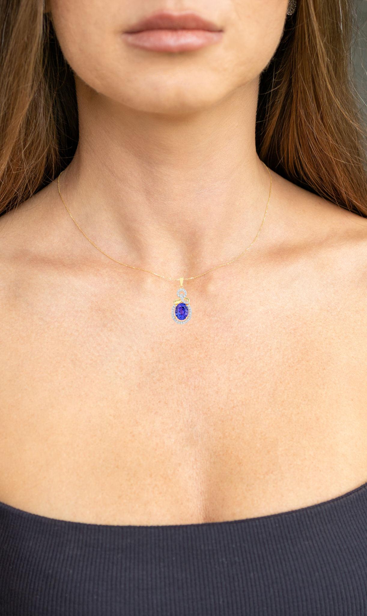 Contemporary Tanzanite Pendant Necklace Diamonds 3.9 Carats 14K Yellow Gold For Sale
