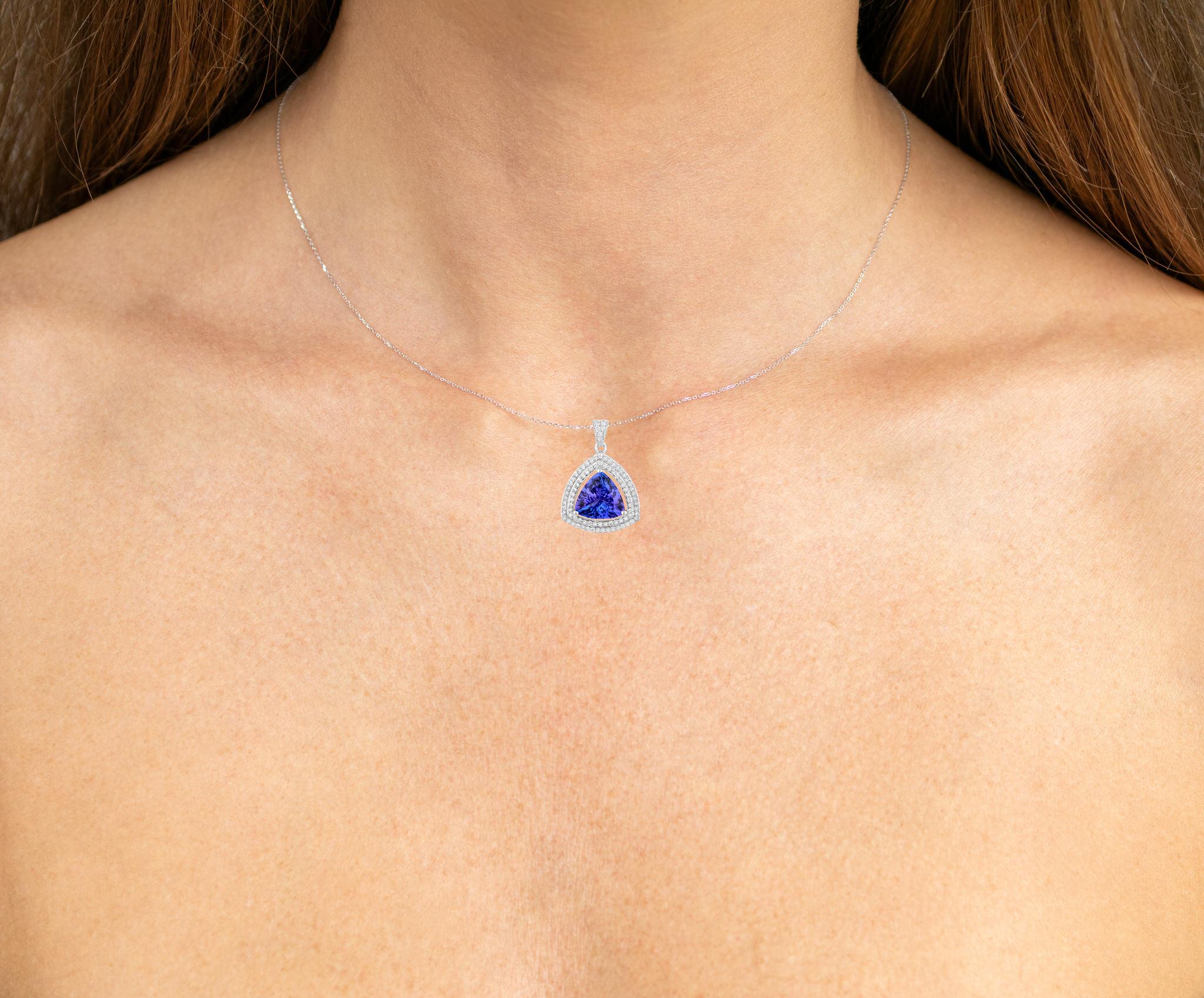 It comes with the Gemological Appraisal by GIA GG/AJP
All gemstones are natural
Tanzanite = 3.52 Carats
87 Diamonds = 0.40 Carats
Metal: 14K White Gold
Dimensions: 24 x 17 x 7 mm
Chain Included: 14K White Gold
Chain Length: 16 Inches