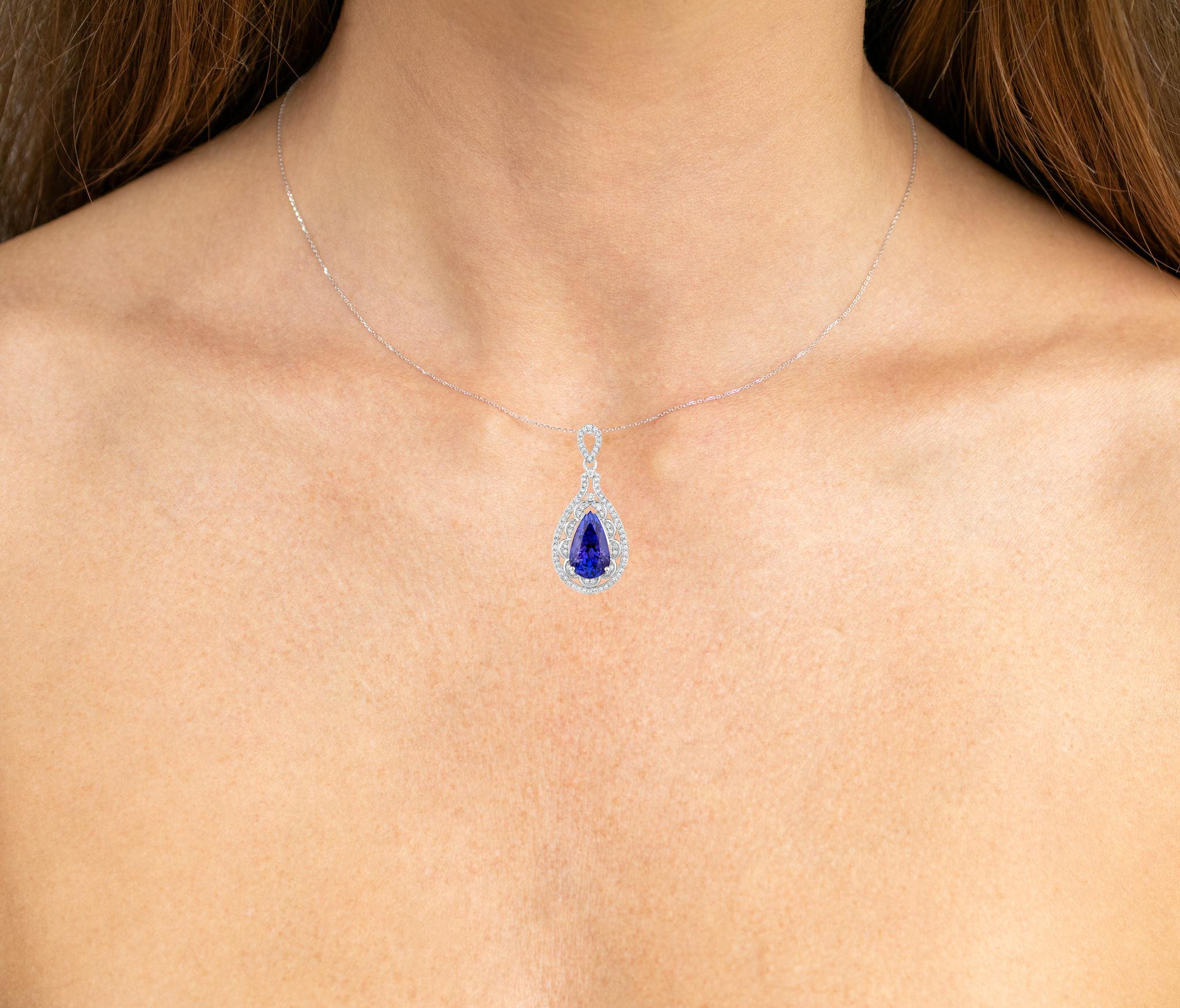 It comes with the Gemological Appraisal by GIA GG/AJP
All gemstones are natural
Tanzanite = 6.17 Carats
83 Diamonds = 0.53 Carats
Metal: 14K White Gold
Dimensions: 36 x 17 x 8 mm
Chain Included: 14K White Gold
Chain Length: 16 Inches