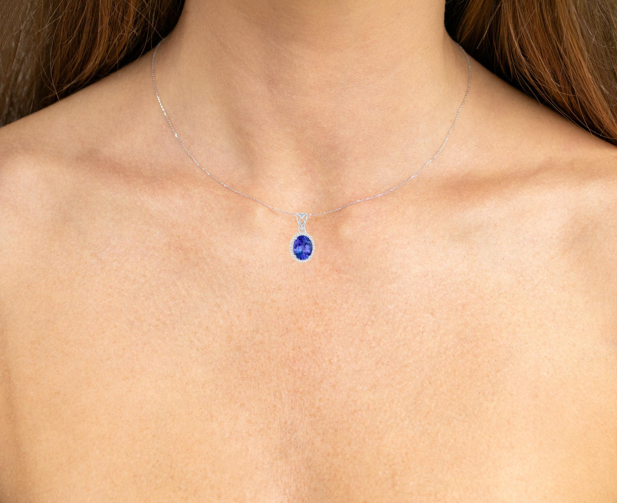It comes with the Gemological Appraisal by GIA GG/AJP
All Gemstones are Natural
Tanzanite = 2.67 Carats
Cut: Oval
30 Round Diamonds = 0.13 Carats
Metal: 14K White Gold
Pendant Dimensions: 20.5 x 10.5 mm