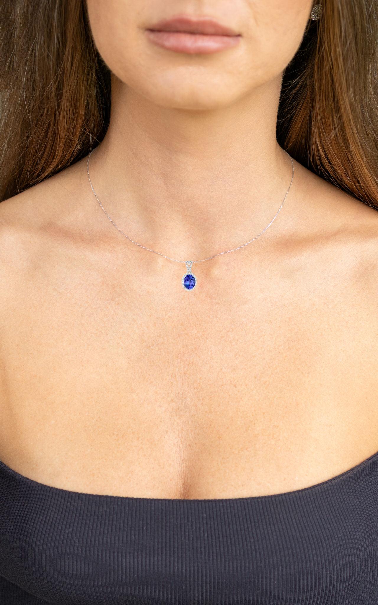 Contemporary Tanzanite Pendant Necklace With Diamond Halo 2.8 Carats Total 14K Gold For Sale