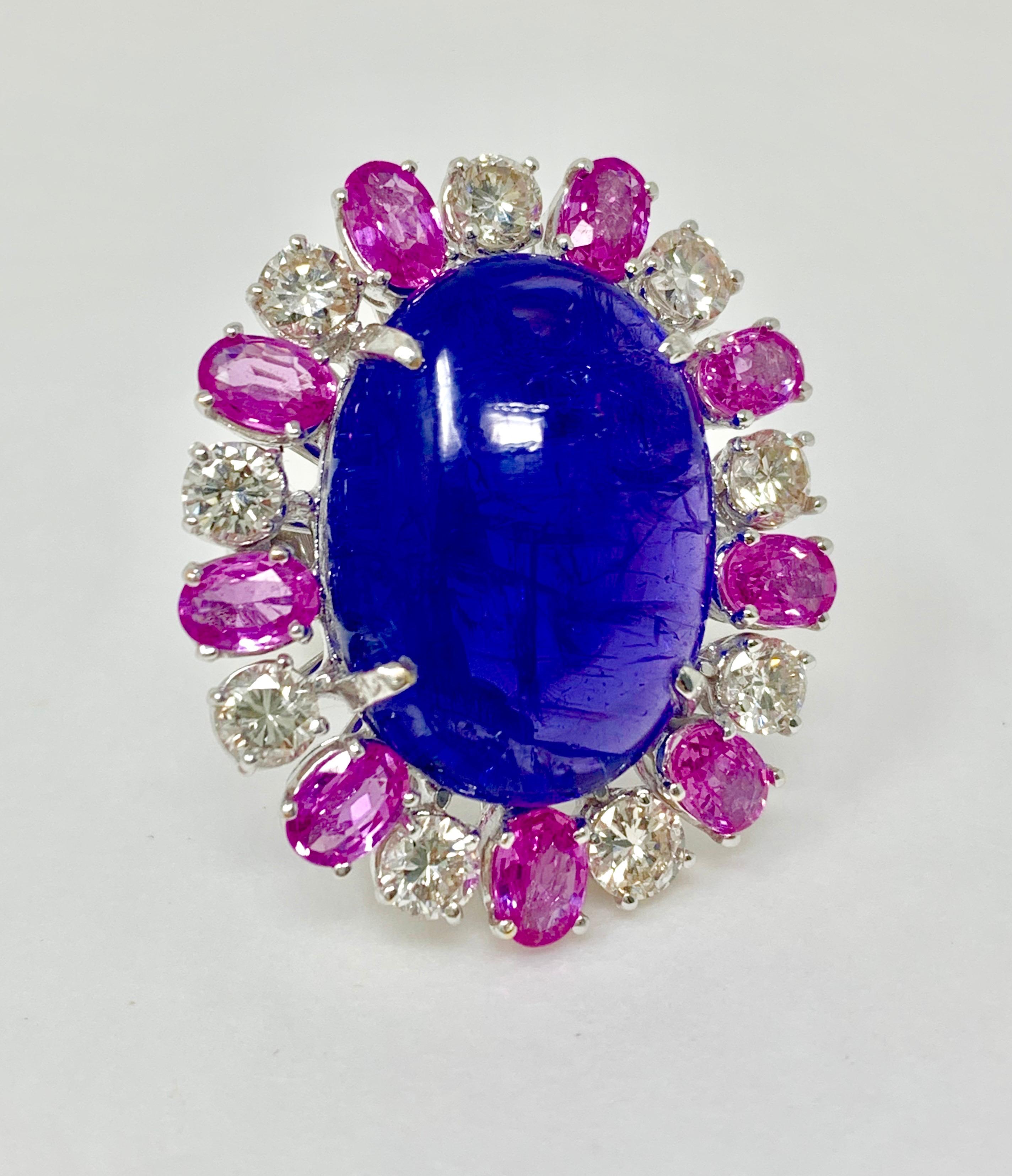 Contemporary Tanzanite, Pink Sapphire and Diamond Ring in 14 Karat White Gold