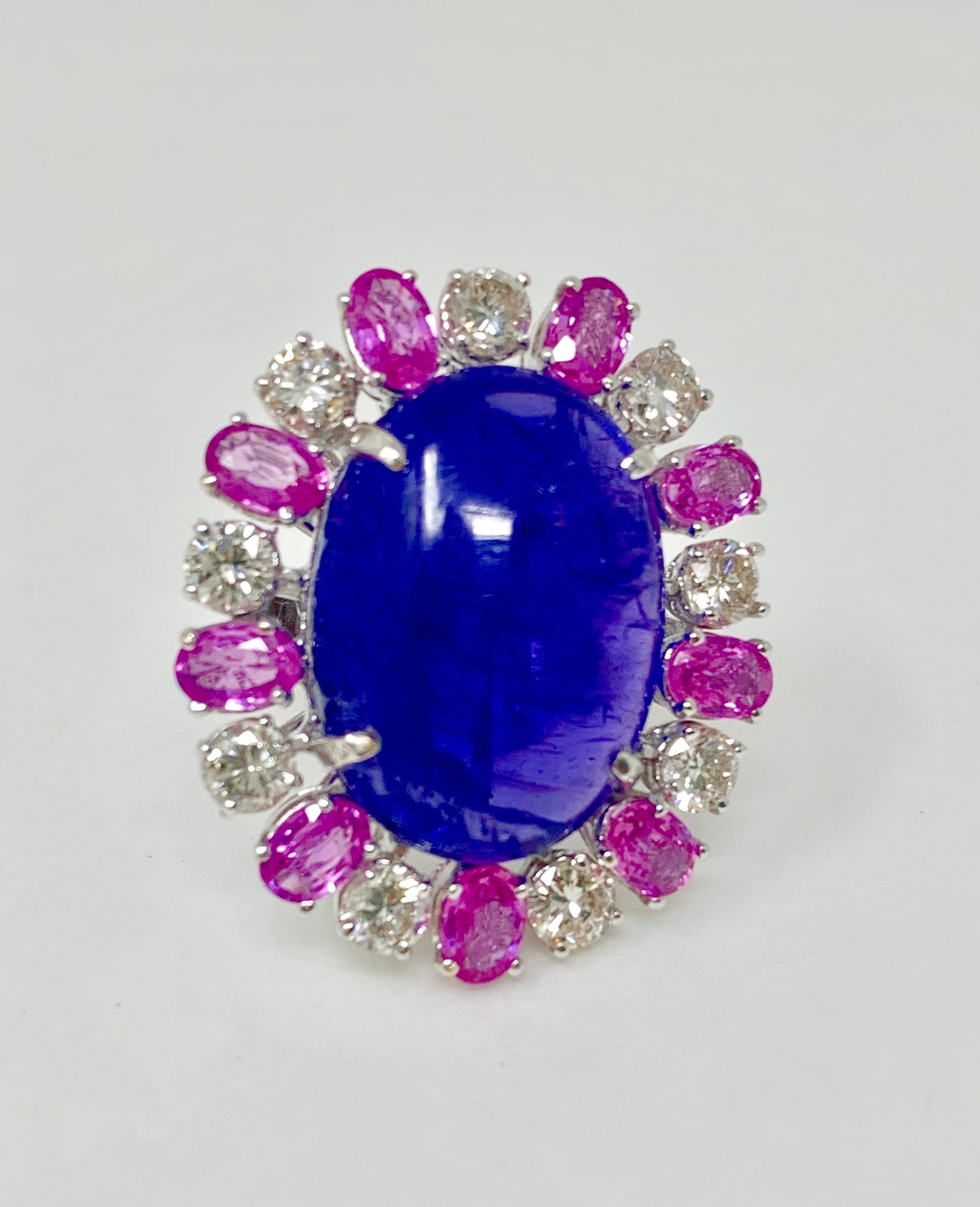 Oval Cut Tanzanite, Pink Sapphire and Diamond Ring in 14 Karat White Gold