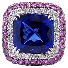 Anello con tanzanite, zaffiro rosa e diamante incastonati in oro bianco 18 carati