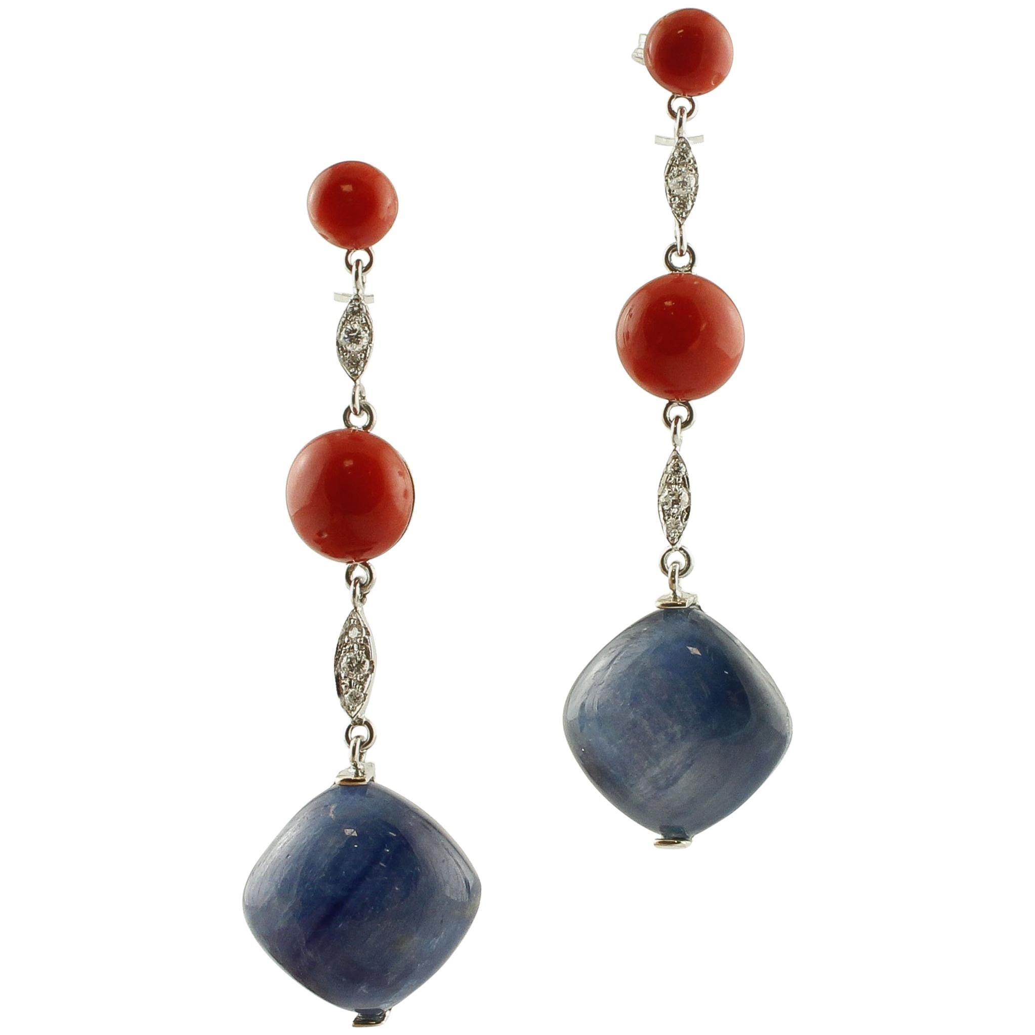 Tanzanite, sfere di corallo rosso, diamanti, orecchini a pendente in oro bianco
