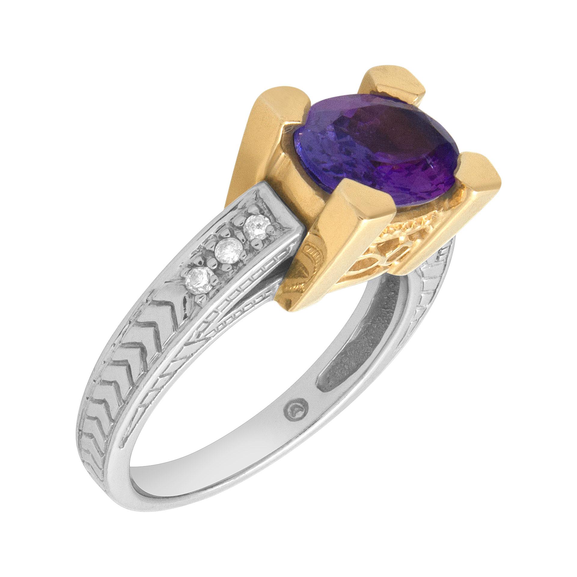 Beautiful tanzanite ring (1.50 cts) with diamond accents in 14k white and yellow gold. Size 6. Top of the ring measures 8mm x 9.5mm; shank measures 2mm.

This ring is currently size 6 and some items can be sized up or down, please ask! It weighs 4.1