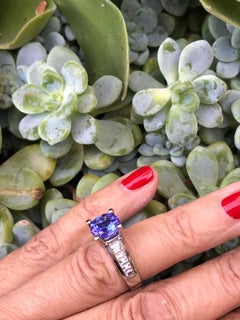 Tanzanite and Diamond Ring 5.24 Carats with Baguette Diamonds,  18 Karat Gold