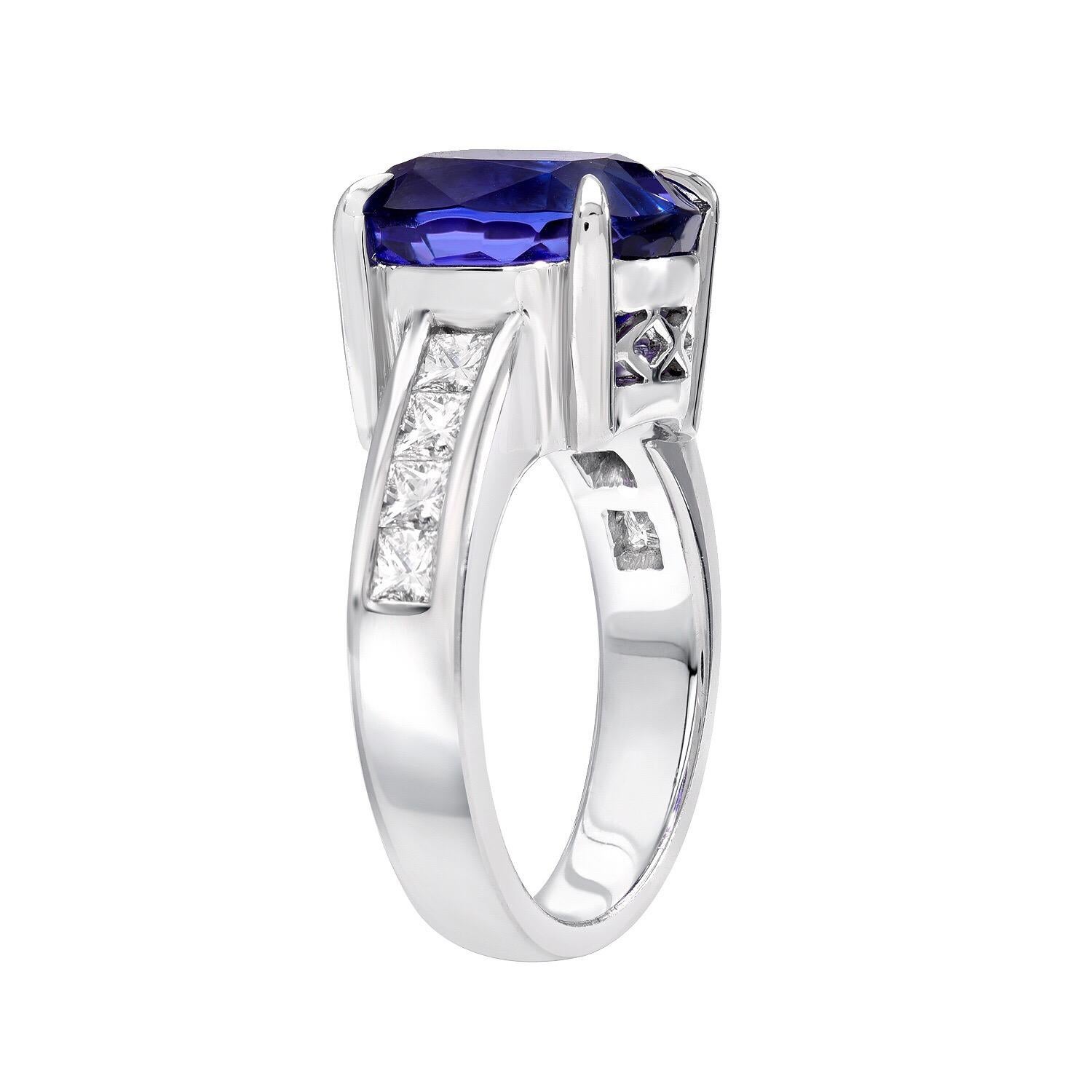 Spectacular 6.80 carat cushion cut Tanzanite, set in a 18K white gold ring for women, adorned by a total of 0.65 carat princess cut diamonds.
Ring size 5.5. Re-sizing is complementary upon request.
Returns are accepted and paid by us within 7 days