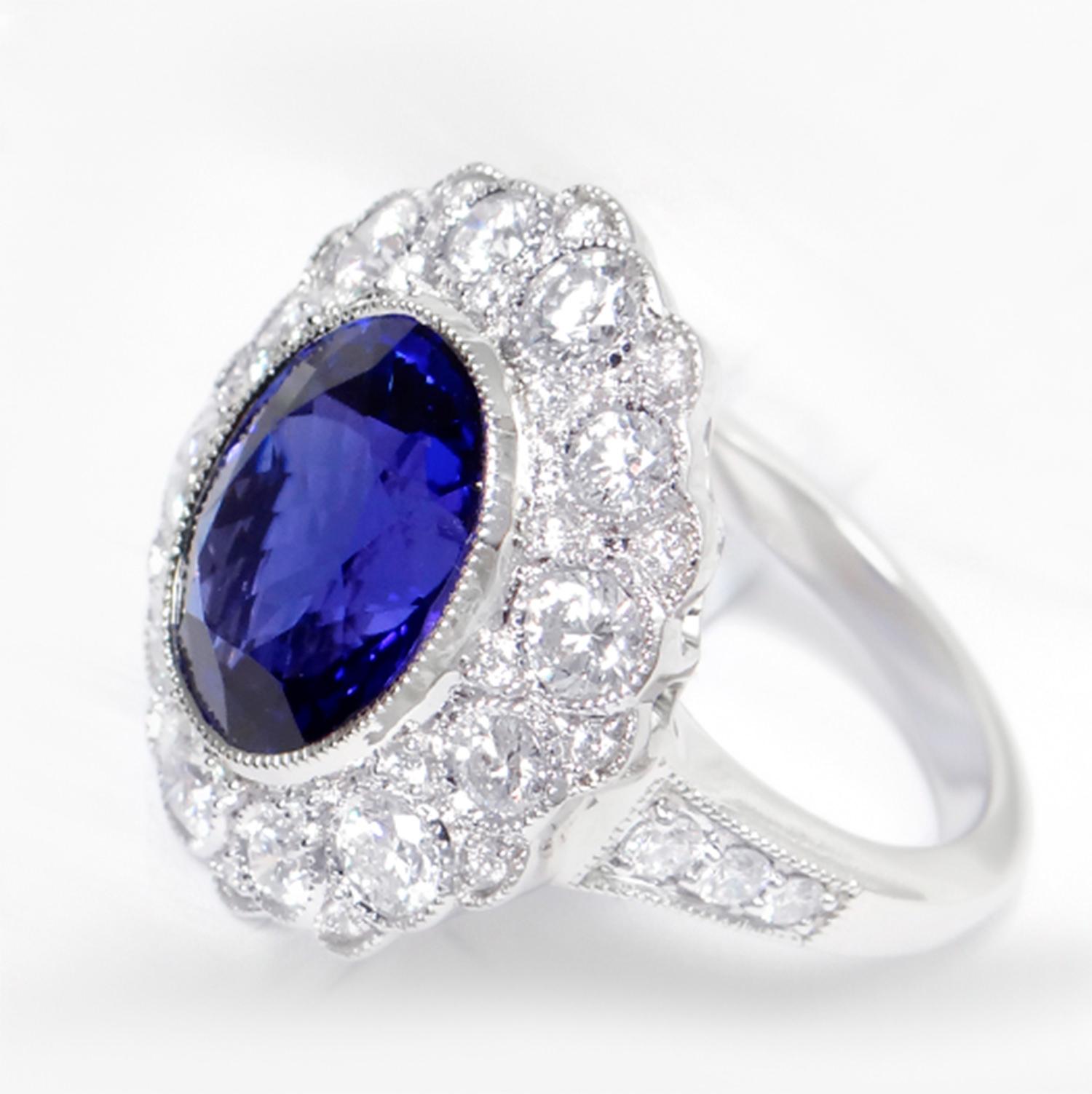 Contemporary Tanzanite Ring Diamond Setting 7.7 Carats 18K White Gold For Sale