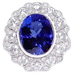 Anello di tanzanite con diamanti 7,7 carati in oro bianco 18 carati