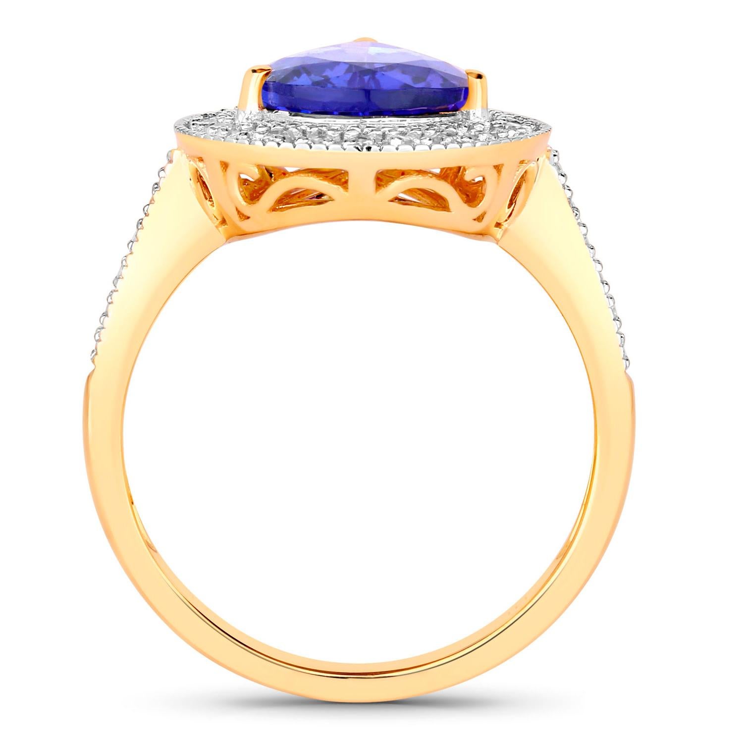 Pear Cut Tanzanite Ring Diamonds 3.35 Carats 14K Yellow Gold For Sale