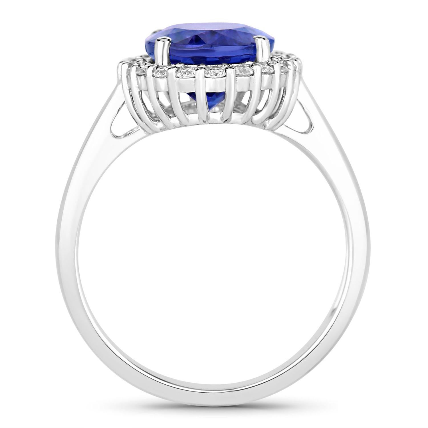 Oval Cut Tanzanite Ring Diamonds 3.93 Carats 14K White Gold For Sale