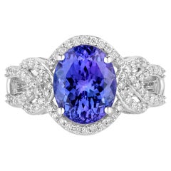 Anello di tanzanite con diamanti da 4,06 carati in oro bianco 14K