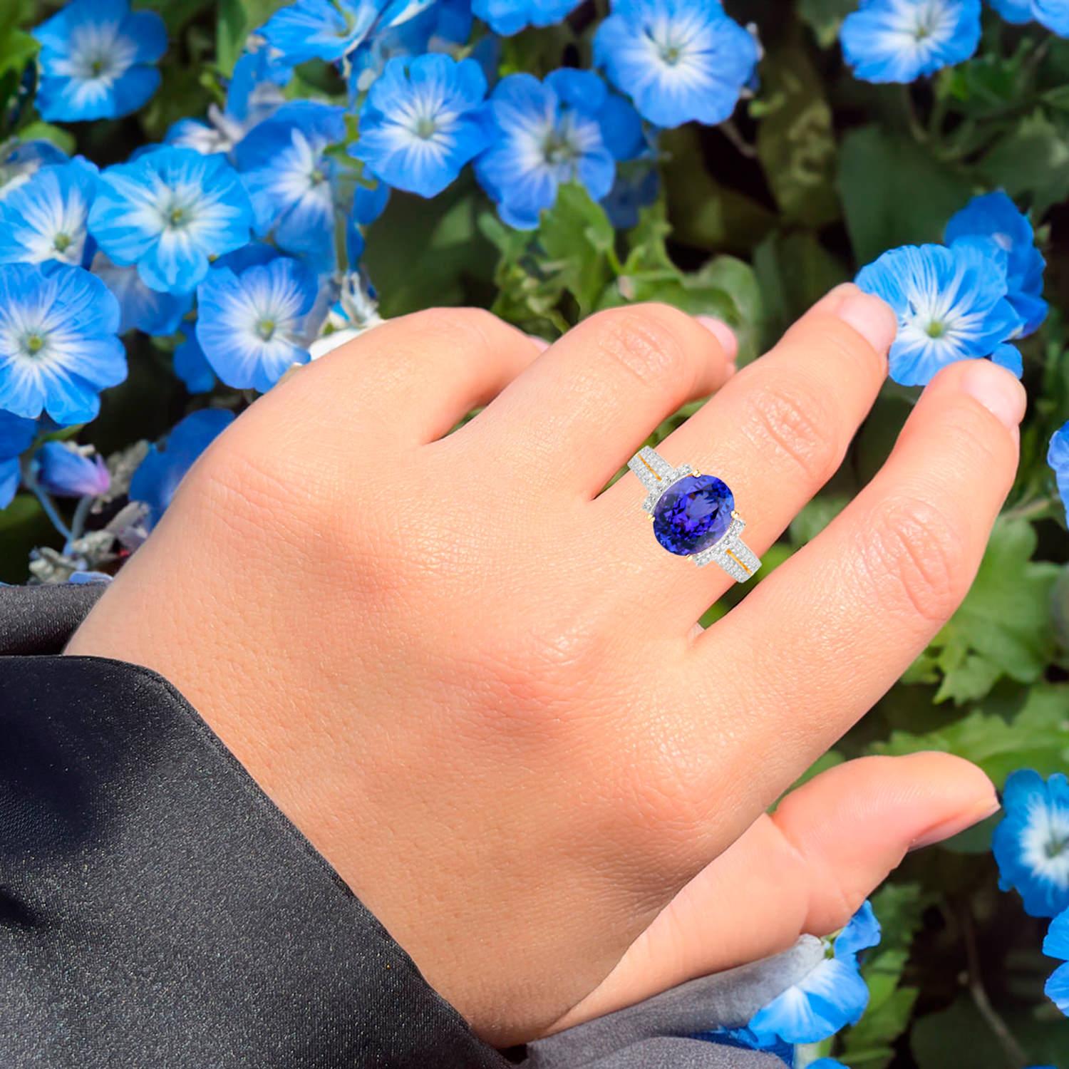 It comes with the Gemological Appraisal by GIA GG/AJP
All gemstones are natural
Tanzanite = 3.76 Carats
42 Diamonds = 0.42 Carats
Metal: 14K Yellow Gold
Ring Size: 7* US
*It can be resized complimentary