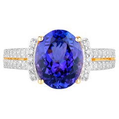 Anello con tanzanite e diamanti 4,18 carati in oro giallo 14K