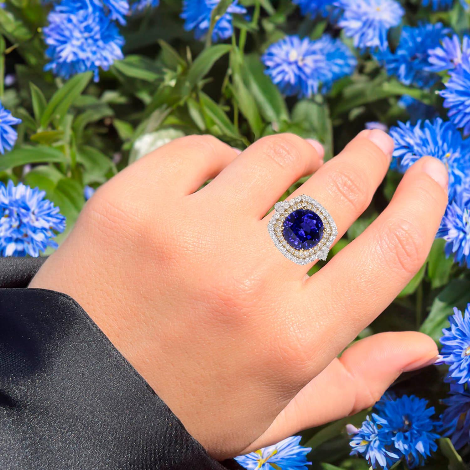 It comes with the Gemological Appraisal by GIA GG/AJP
All gemstones are natural
Tanzanite = 5.47 Carats
120 Diamonds = 1.74 Carats
(Color: G, Clarity: VS)
Metal: 18K White Gold
Ring Size: 6.5* US
*It can be resized complimentary
